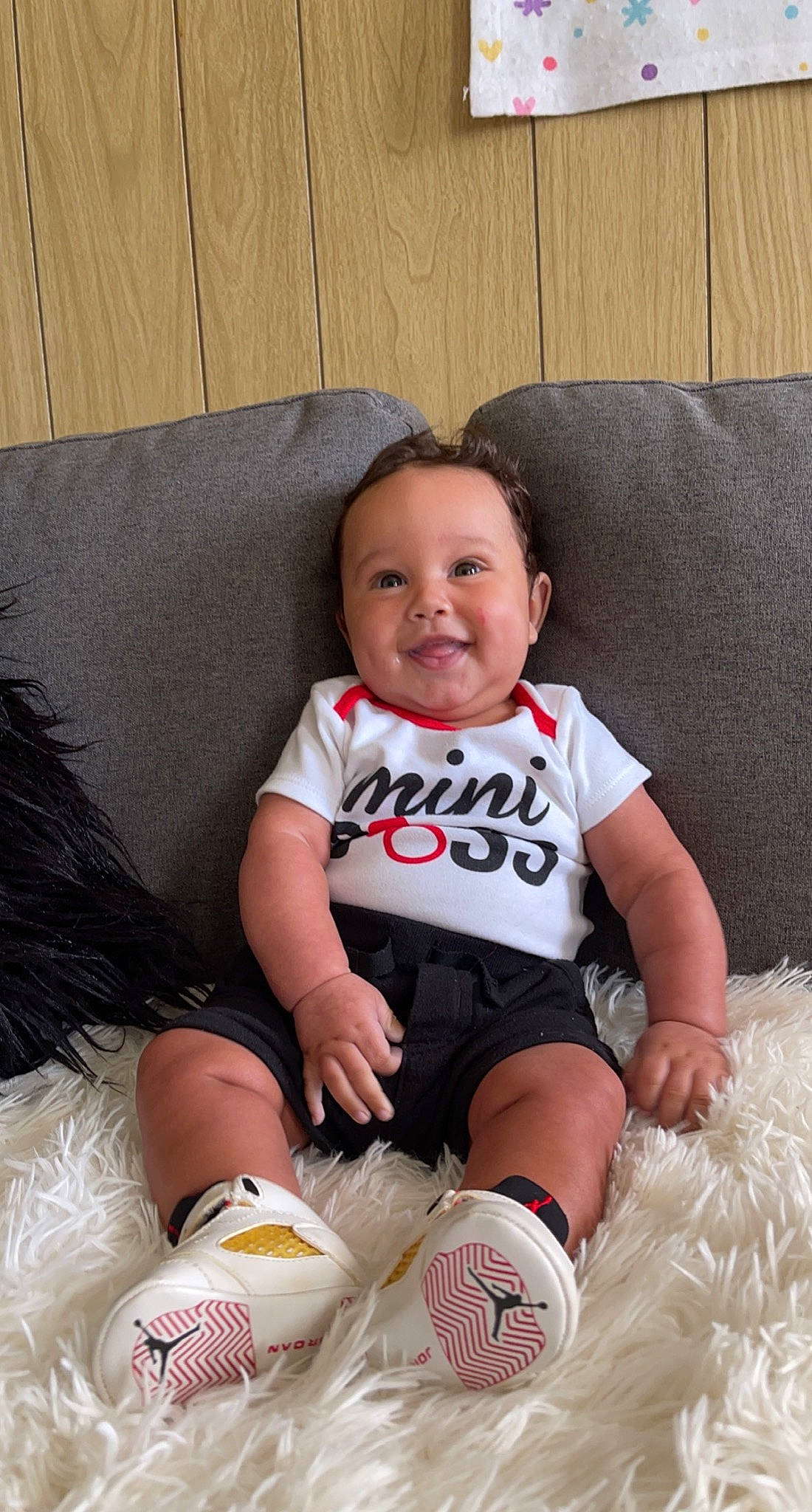 Kayson joined the competition — help win amazing prizes! baby, baby_toddler_clothing, ball, child, comfort, couch, eye, football, fun, happy, head, human_leg, joy, knee, leg, person, skin, sleeve, smile, sock