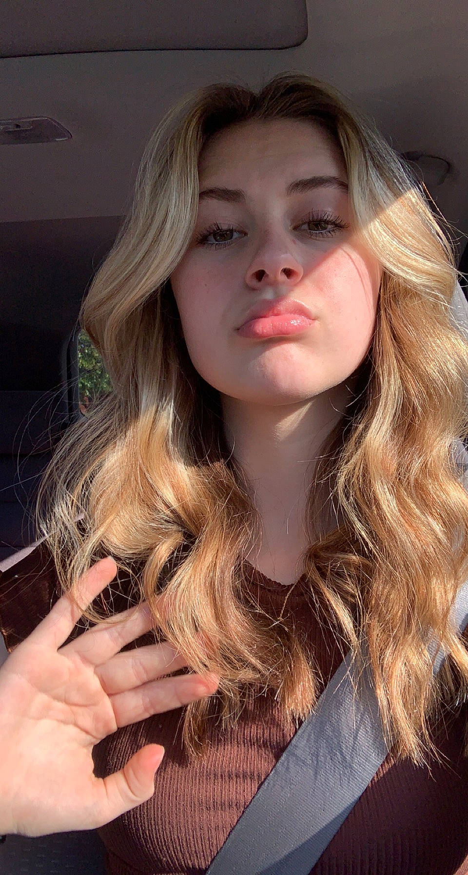 Emma is registered to the contest to win money with this photo: black_hair, blond, brown_hair, chin, close_up, eyebrow, eyelash, flash_photography, gesture, hair, layered_hair, lip, lipstick, long_hair, mouth, nail, person, shoulder, skin, step_cutting