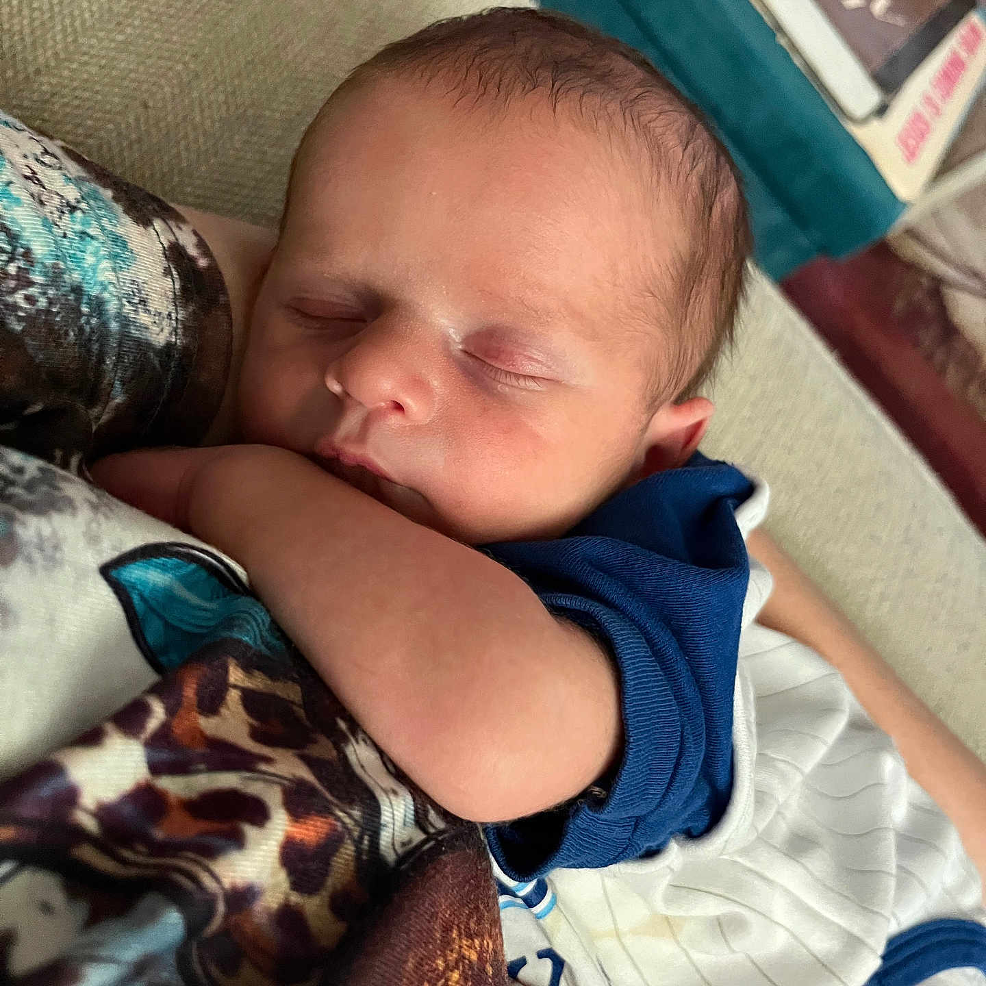 Ezekiel is registered to the contest to win money with this photo: baby, bed, blanket, bodypart, clothing, couch, cushion, face, finger, furniture, hand, head, homedecor, newborn, person, photography, portrait, quilt, sleeping, t_shirt