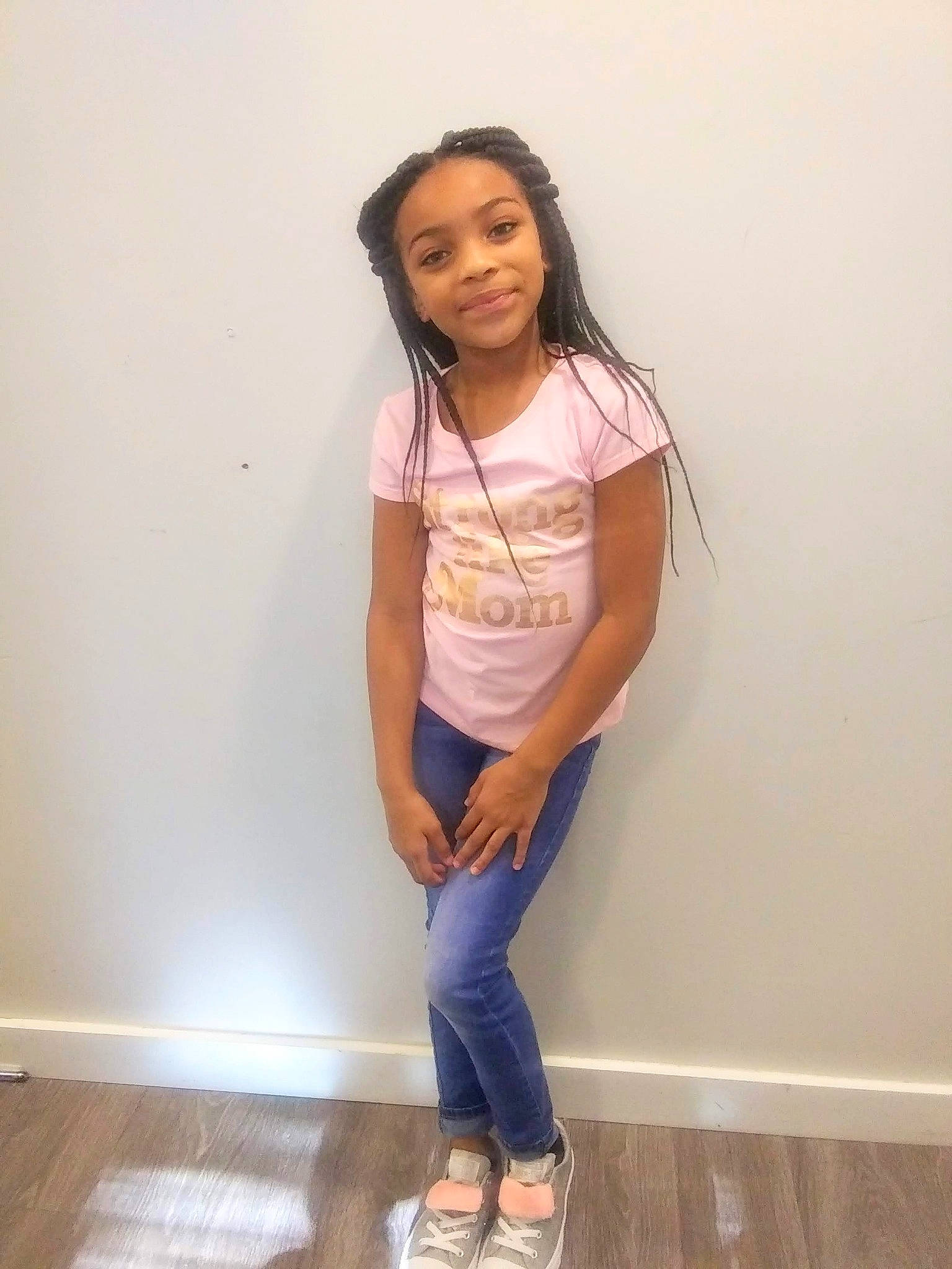 Selena is registered to the contest to win money with this photo: arm, eye, face, fashion_design, flash_photography, floor, flooring, hair, happy, head, joint, joy, knee, leg, neck, person, sleeve, sportswear, standing, t_shirt