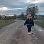 Léa a rejoint le concours — aidez-le/la à gagner de superbes lots ! child, city, clothing, coat, face, female, girl, grass, head, jacket, pants, path, person, photography, plant, portrait, road, street, urban, walking