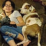 Mini Moo joined the competition — help win amazing prizes! barefoot, blurred, brown_couch, casual, comfort, companion, couch, dog, furniture, glasses, home, indoor, jeans, leisure, person, pet, relaxing, resting, short_sleeve, spotted_dog