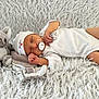 newborn, baby, sleeping, pacifier, plush_toy, koala, white_clothing, hat, blanket, soft_texture, infant, resting, cute, peaceful, indoor, child, tiny_hand, cozy, portrait, babywear