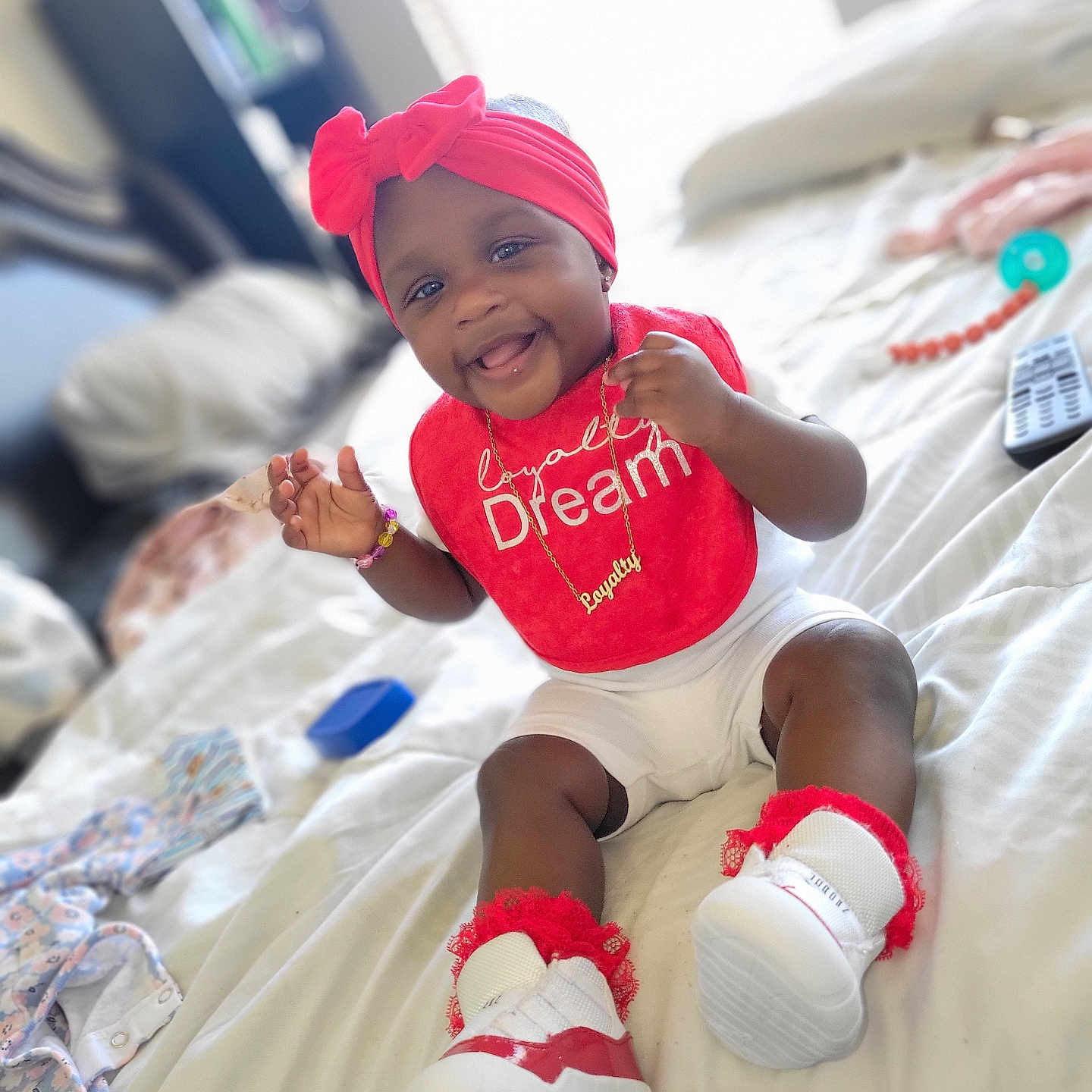 Loyalty is registered to the contest to win money with this photo: accessories, baby, baseballcap, bodypart, cap, clothing, face, finger, footwear, hand, hat, head, jewelry, necklace, person, photography, portrait, shoe, sitting, sneaker