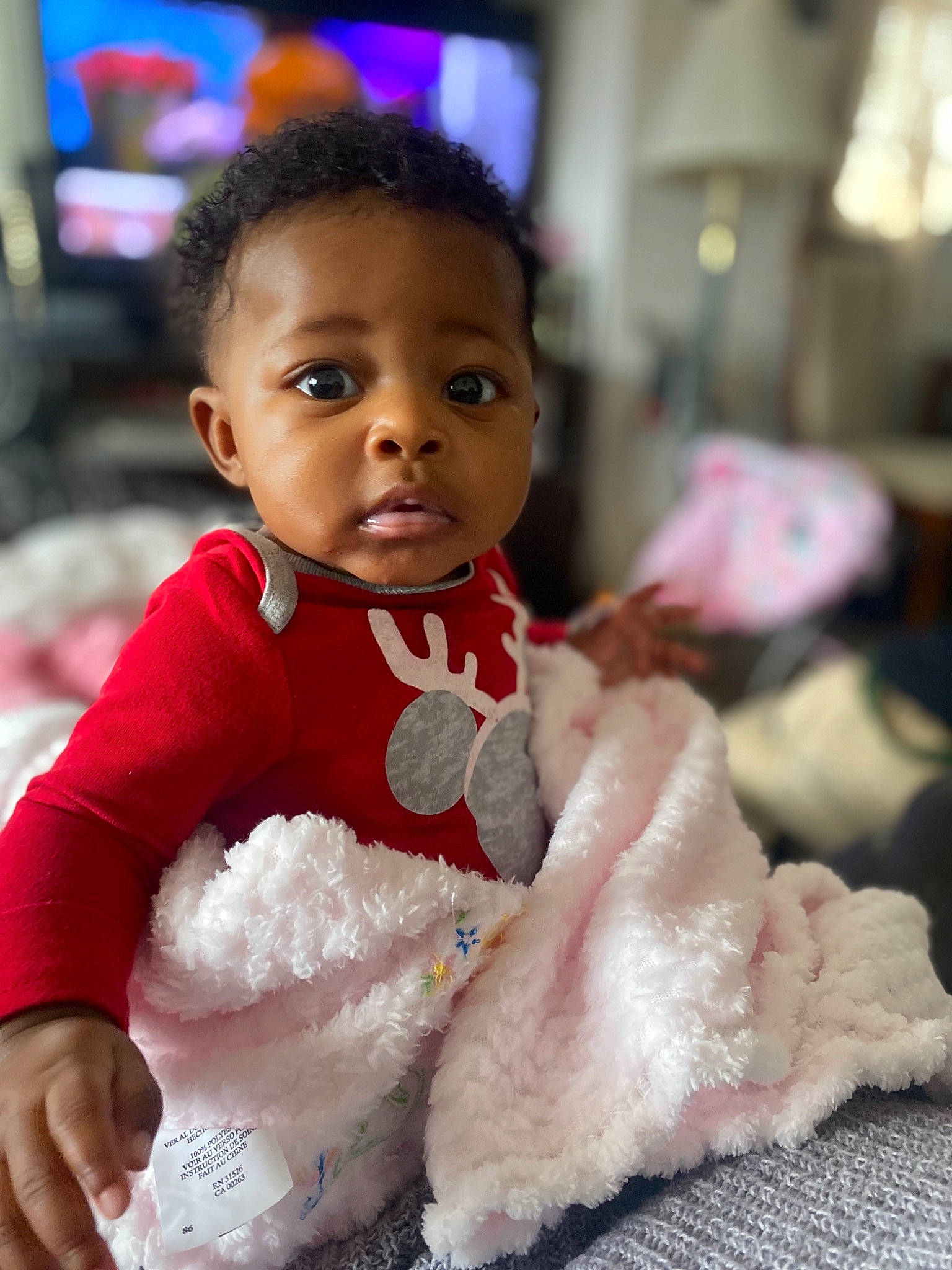 Merci is registered to the contest to win money with this photo: baby, cheek, child, fur, head, person, pink, play, smile, stuffed_toy, toddler, toy