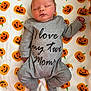 baby, newborn, sleeping, onesie, clothing, grey, blanket, pumpkin, jack_o_lantern, orange, white, infant, cute, peaceful, lying_down, child, portrait, festive, halloween, soft