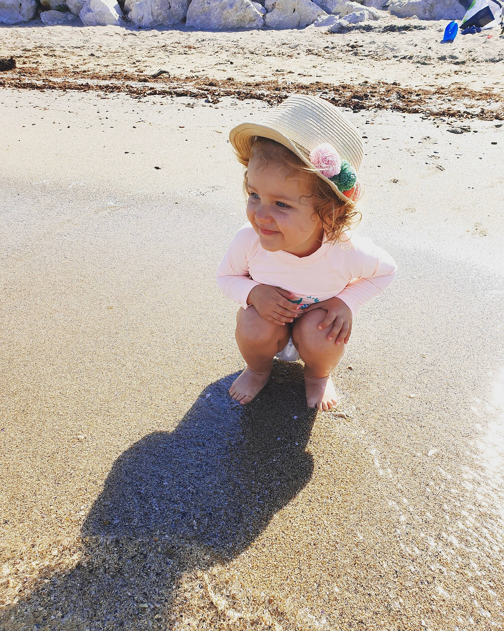Apolline a rejoint le concours — aidez-le/la à gagner de superbes lots ! asphalt, azure, beach, body_of_water, cap, fedora, fun, happy, hat, headgear, human, landscape, leg, morning, people, people_in_nature, person, summer, sun_hat, sunlight