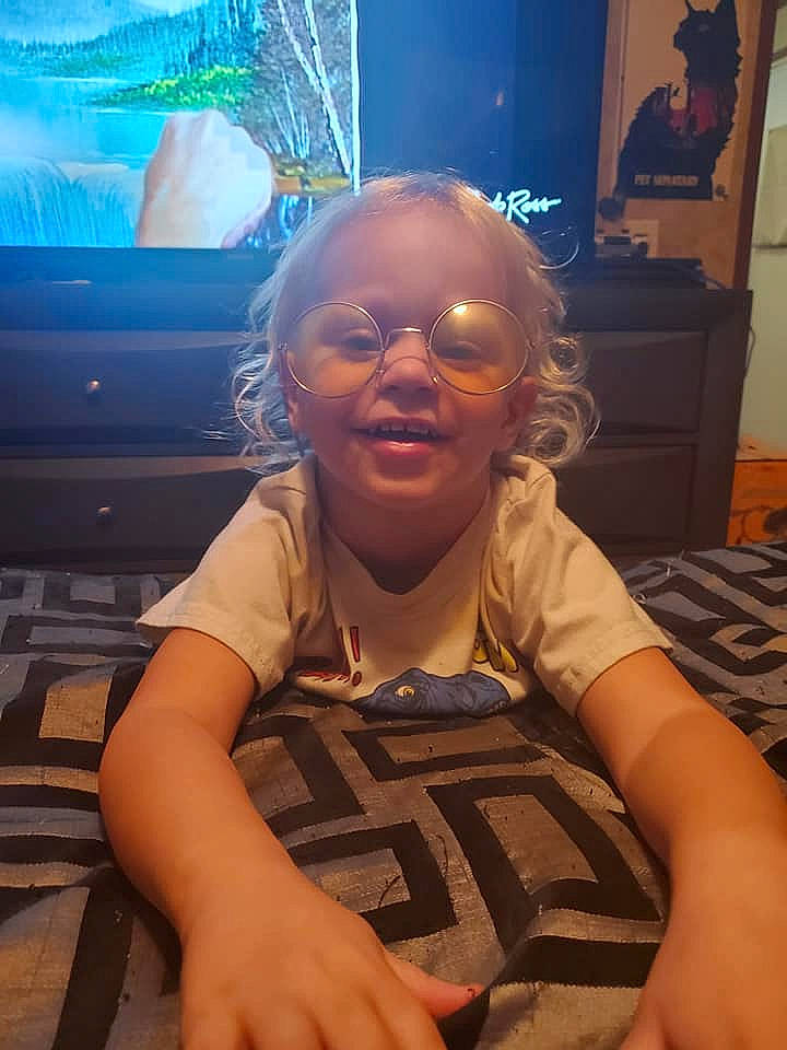 Alekzander joined the competition — help win amazing prizes! child, comfort, event, eyewear, floor, flooring, fun, gadget, happy, leisure, mouth, person, shoulder, sitting, skin, smile, standing, television, thumb, toddler