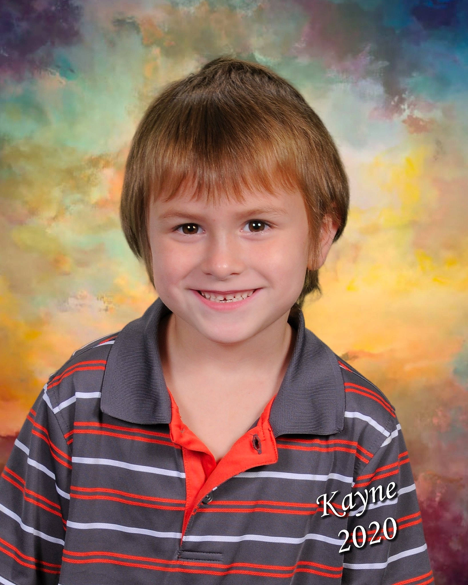 Kayne is registered to the contest to win money with this photo: cheek, child, chin, dress_shirt, electric_blue, eyebrow, face, flash_photography, forehead, fun, happy, head, iris, joy, nose, pattern, people_in_nature, person, plaid, sleeve