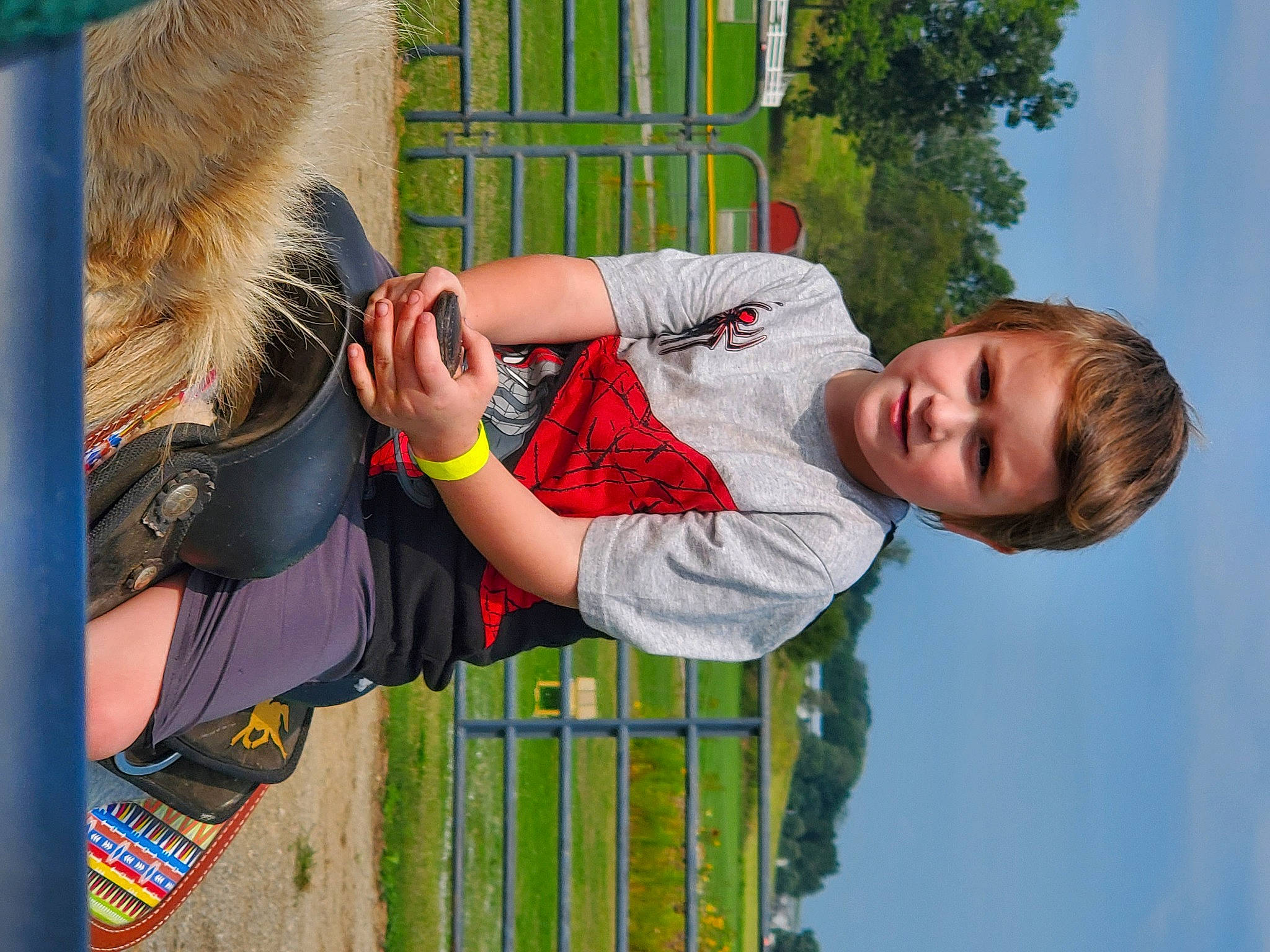 Kayne joined the competition — help win amazing prizes! child, facial_expression, fun, fur, gesture, grass, happy, leisure, people_in_nature, person, play, player, recreation, sky, smile, t_shirt, toddler, tree, wildlife, wildlife_biologist