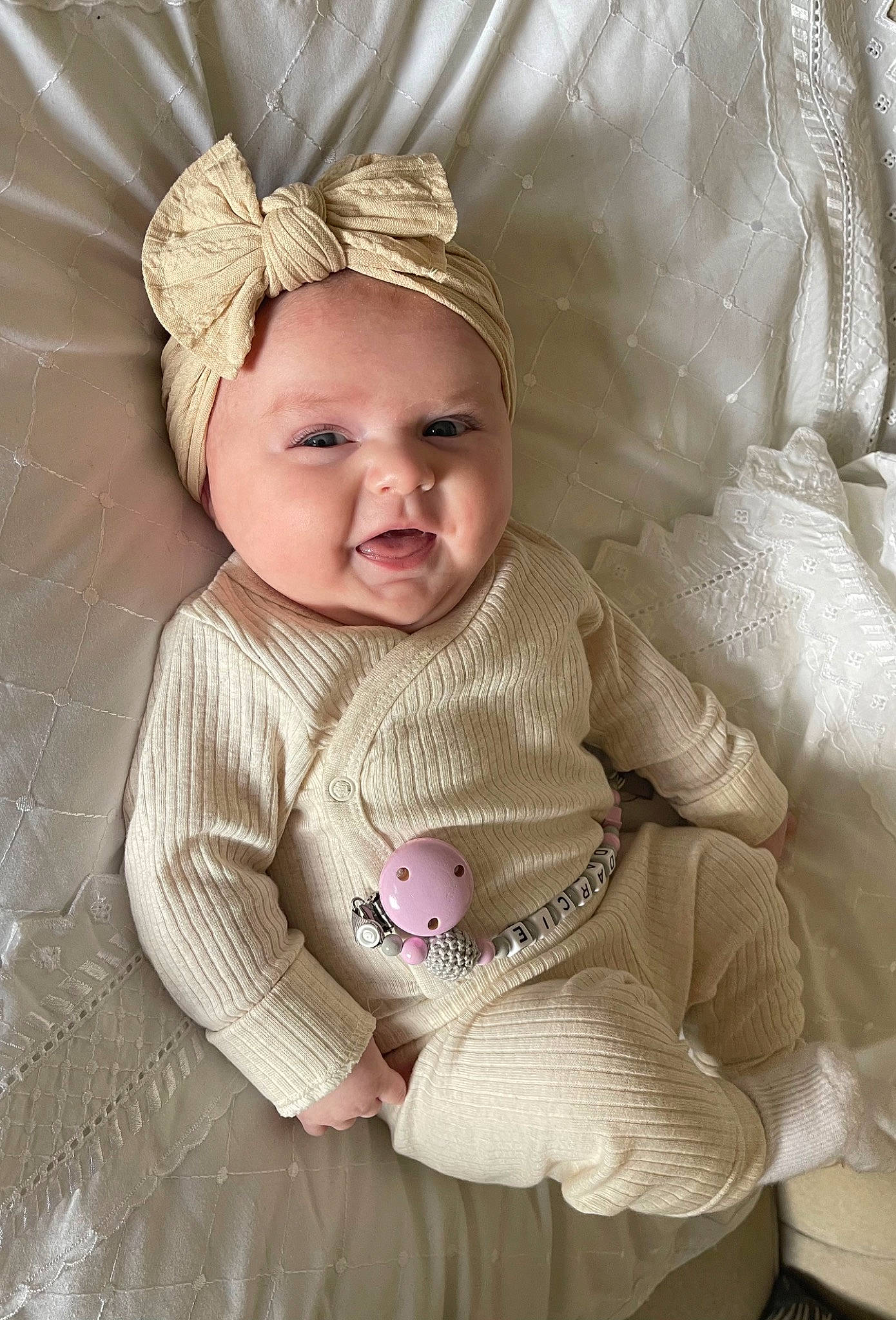Darcie is registered to the contest to win money with this photo: baby, baby_toddler_clothing, cheek, chin, comfort, eye, eyebrow, face, happy, head, headgear, headwear, human_body, iris, lip, person, pink, skin, sleeve, smile