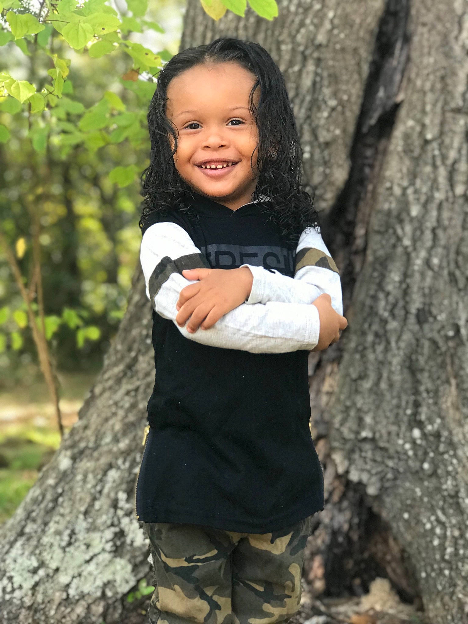 Elijah is registered to the contest to win money with this photo: child, child_model, happy, joy, person, photo_shoot, photograph, photography, plant, smile, toddler, tree, trunk, woodland