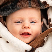 Harry joined the competition — help win amazing prizes! baby, blanket, face, infant, closeup, soft, cute, child, wrapped, warm, skin, expression, head, portrait, young, comfort, cozy, eyes, mouth, newborn