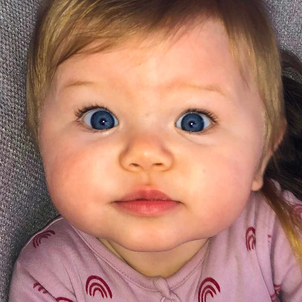 Verity joined the competition — help win amazing prizes! baby, blonde, bodypart, clothing, couch, cushion, face, furniture, hair, happy, head, homedecor, newborn, pajamas, person, photography, portrait, selfie, smile, t_shirt