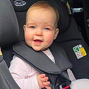Esme And Lola joined the competition — help win amazing prizes! baby, blue_eyes, car_interior, car_seat, child, child_safety, cute, graco, hand, happiness, indoor, infant, portrait, rosy_cheeks, safety, seat, seatbelt, smile, white_clothing, young_child
