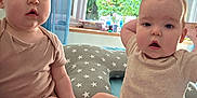 Esme And Lola joined the competition — help win amazing prizes! baby, infant, child, bed, pillow, blanket, onesie, indoor, window, curtains, greenery, stretching, cute, expression, skin, foot, face, person, toddler, home