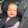 baby, car_interior, car_seat, child, child_in_car_seat, child_safety_seat, clothing, cute, face, graco, happy, head, infant, person, safety, seat, seatbelt, sitting, smile, young_child