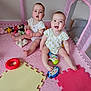 Esme And Lola is registered to the contest to win money with this photo: baby, infant, playmat, toys, foam_puzzle, pink, playpen, smiling, sitting, cute, child, indoors, mesh, colorful, soft, floor, onesie, happy, person, toddler