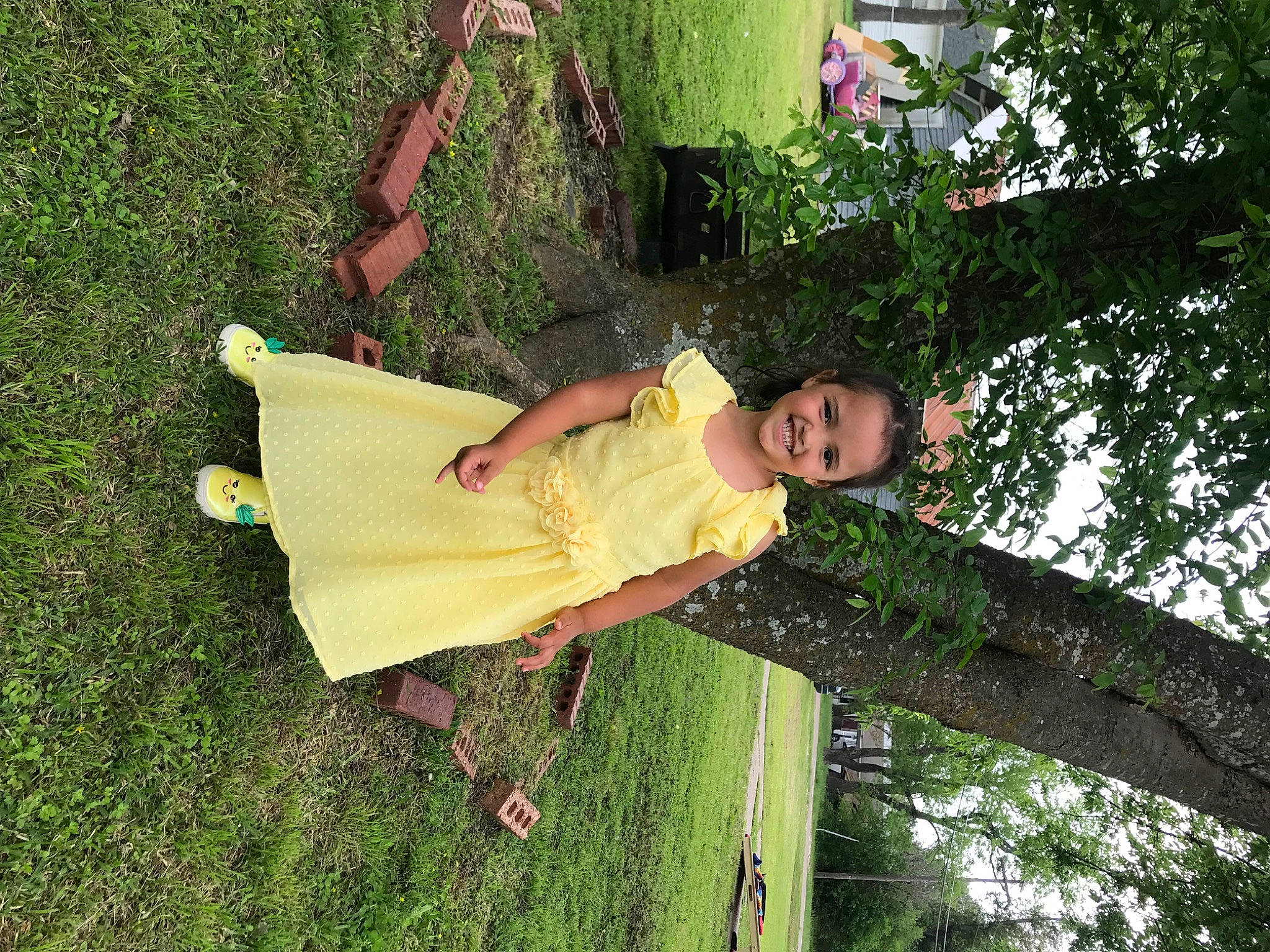 Kaili is registered to the contest to win money with this photo: child, fun, grass, happy, joy, leisure, people_in_nature, person, plant, recreation, sandal, thigh, tints_and_shades, tree, trunk, wood