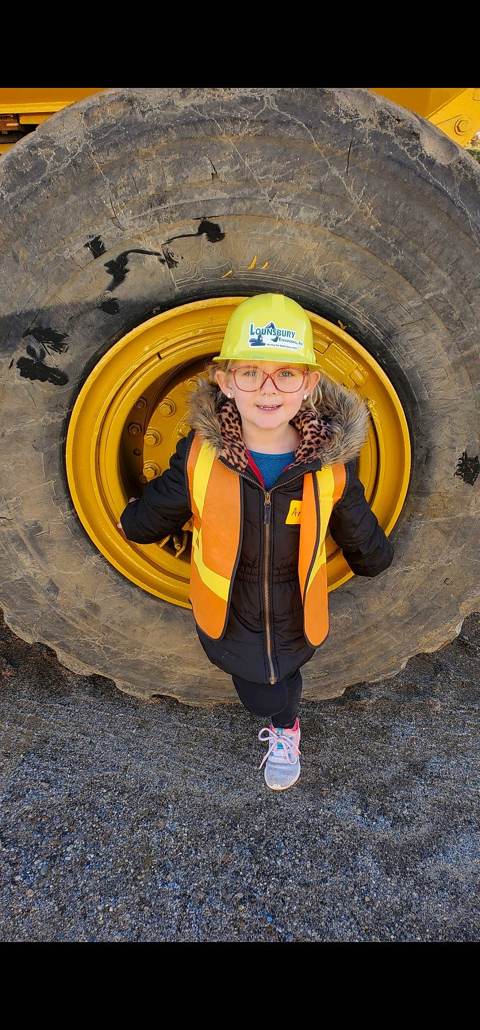 Arabella is registered to the contest to win money with this photo: asphalt, automotive_tire, circle, electric_blue, flash_photography, fun, happy, hat, headwear, helmet, jacket, joy, landscape, people_in_nature, person, personal_protective_equipment, recreation, road_surface, sleeve, smile