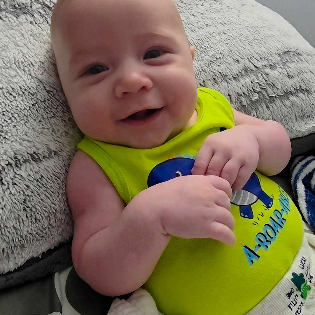 Noah joined the competition — help win amazing prizes! baby, ball, bodypart, couch, cushion, face, finger, furniture, hand, happy, head, homedecor, newborn, person, photography, portrait, smile, sport, tennis, tennisball