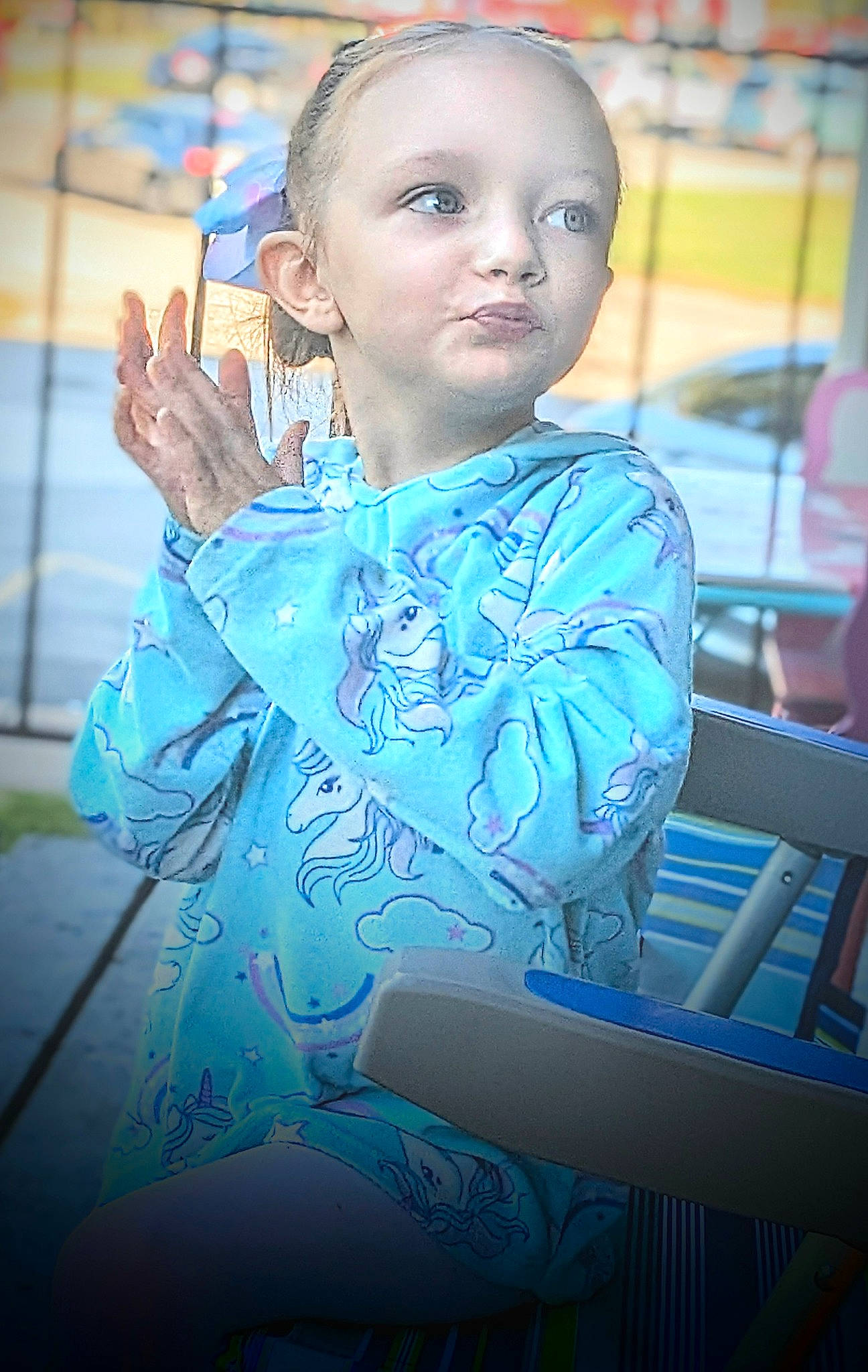 Annabelle is registered to the contest to win money with this photo: child, electric_blue, eye, fashion_accessory, fashion_design, fun, hairstyle, happy, head, jewellery, leisure, necklace, person, portrait_photography, recreation, sitting, skin, toddler, tradition, vacation