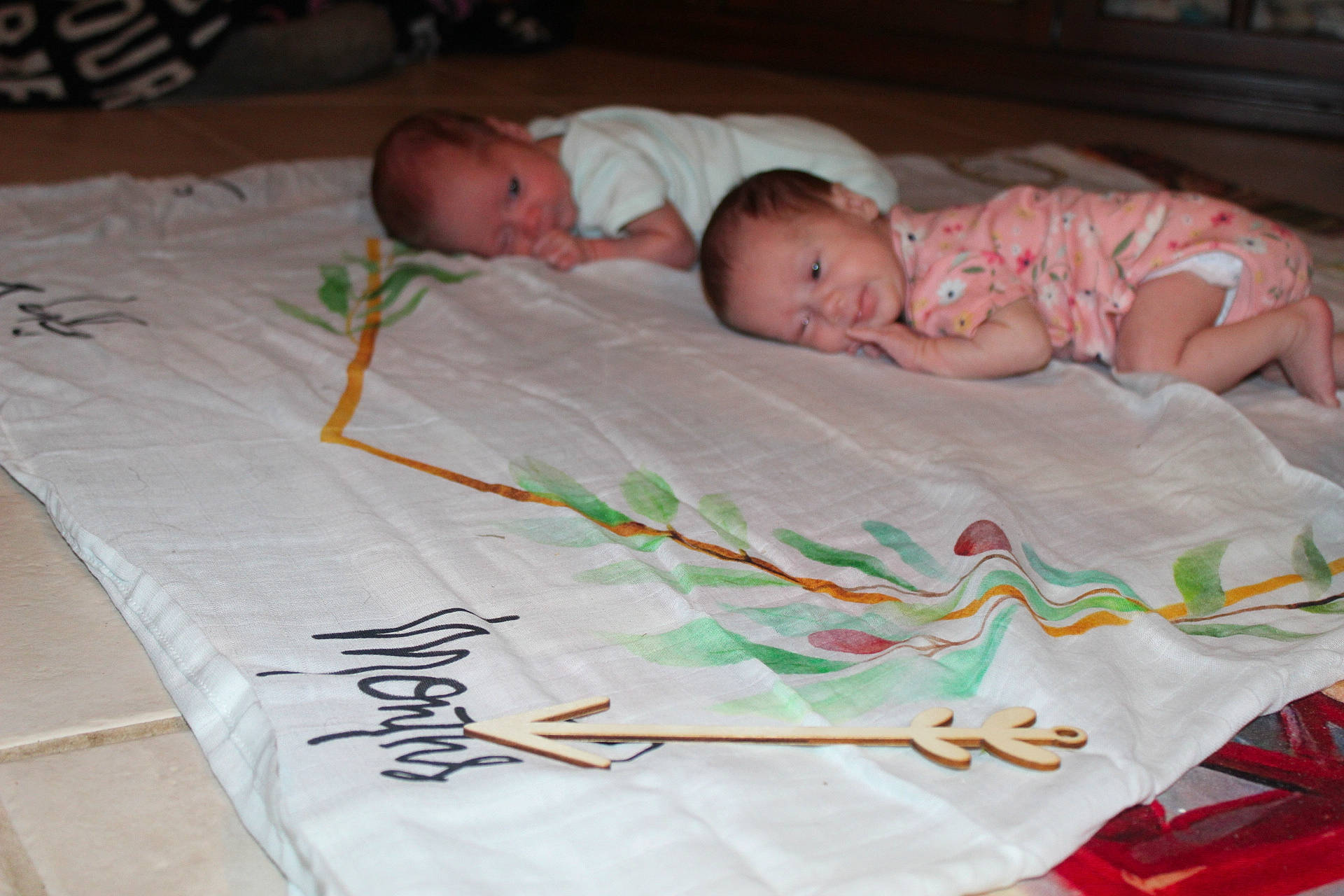 Skye And Sylvie is registered to the contest to win money with this photo: baby, baby_products, baby_toddler_clothing, bedding, bedtime, blanket, child, comfort, face, grass, linens, nap, pattern, person, room, sleep, t_shirt, toddler, white, wood