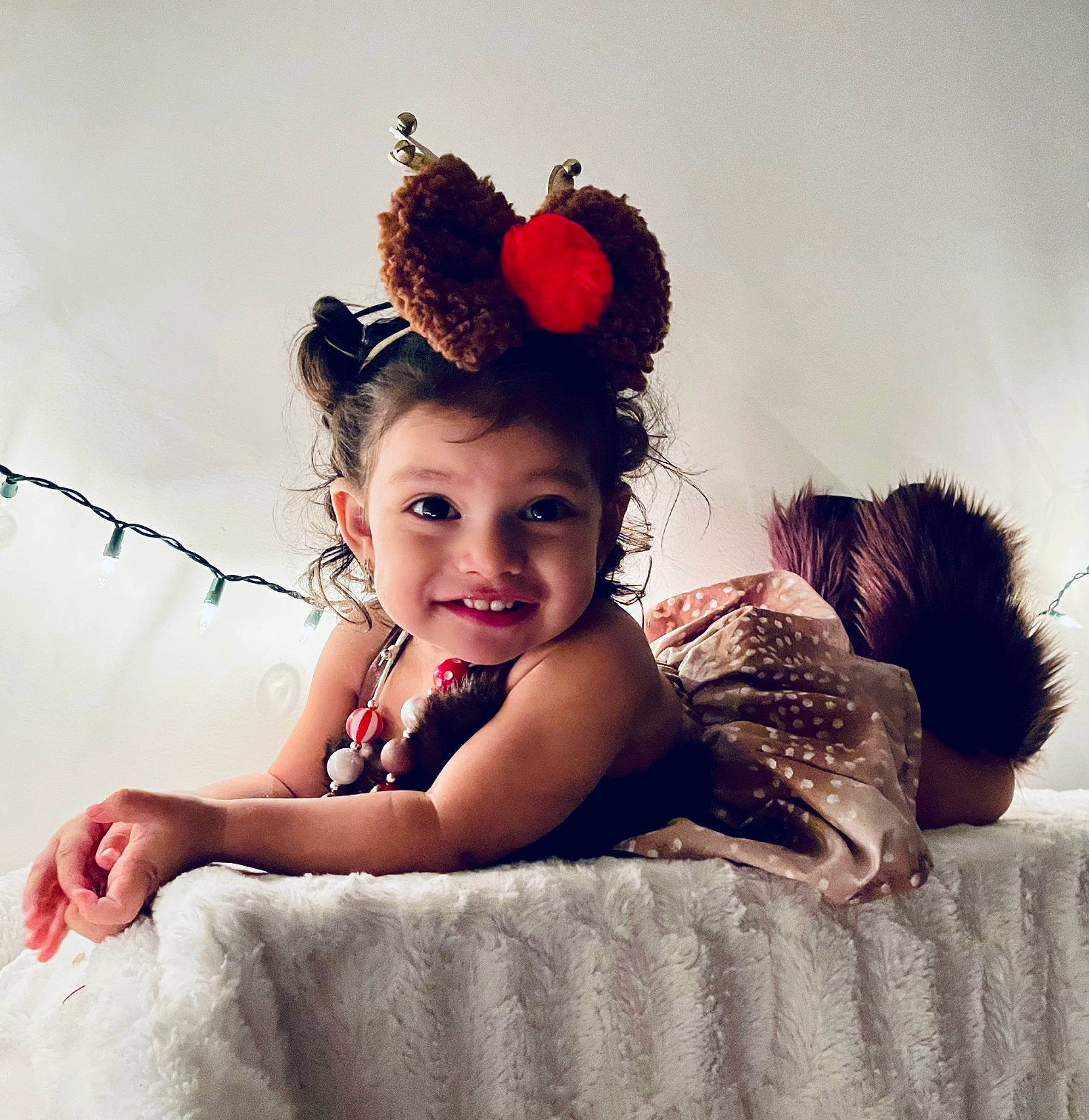 Esmeralda is registered to the contest to win money with this photo: baby, baby_toddler_clothing, brown_hair, child, comfort, costume_hat, eyelash, facial_expression, fashion_accessory, flash_photography, hair_accessory, happy, headband, headgear, headpiece, jewellery, joy, magenta, pattern, person