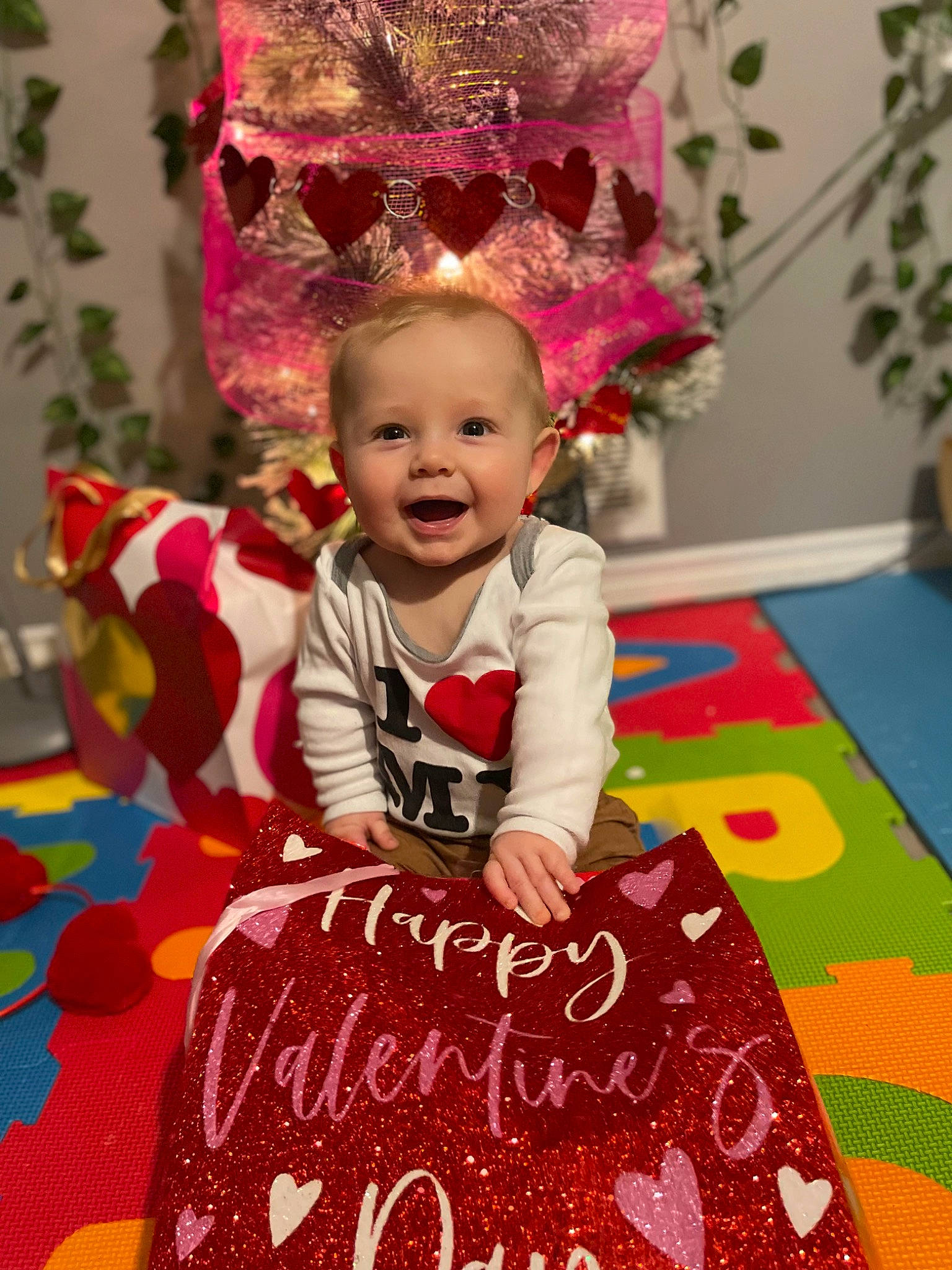 Maverick joined the competition — help win amazing prizes! baby, baby_toddler_clothing, child, event, flooring, fun, happy, magenta, party, pattern, person, pink, plant, play, product, red, room, smile, snapshot, textile