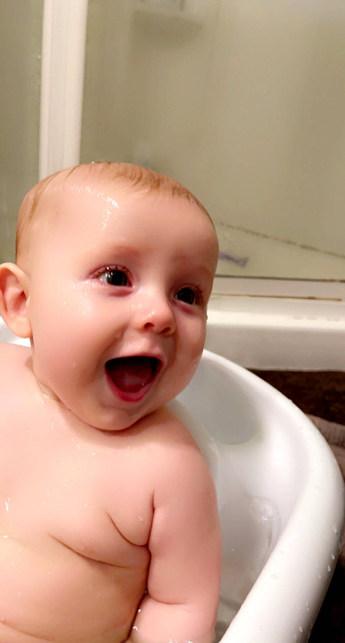 Maverick is registered to the contest to win money with this photo: baby, baby_bathing, bathing, bathroom, bathtub, cheek, chest, ear, eyelash, fluid, happy, iris, jaw, lip, mouth, nose, person, skin, smile, toddler