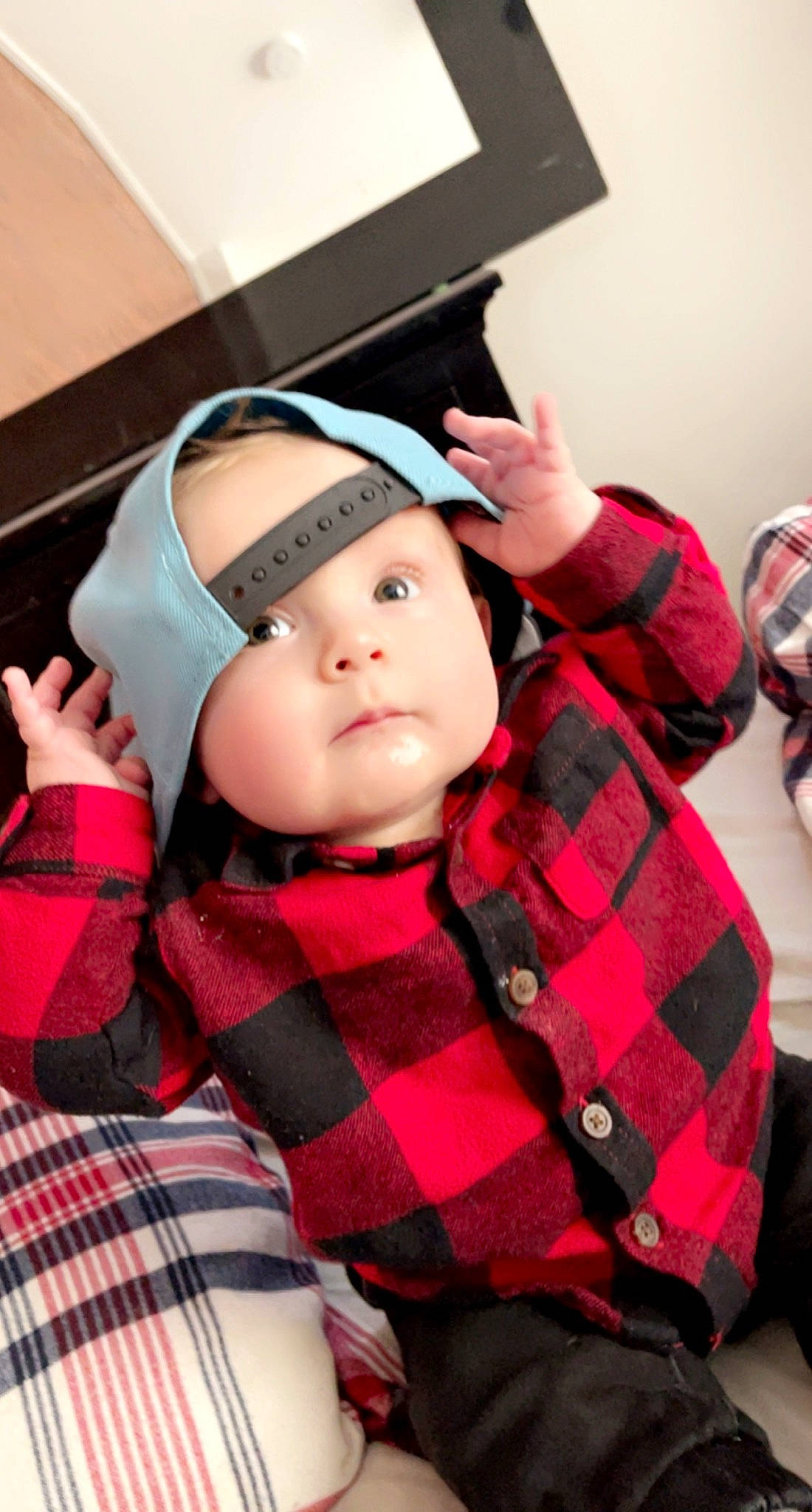 Maverick joined the competition — help win amazing prizes! baby, baby_toddler_clothing, cap, cheek, collar, comfort, eyelash, flash_photography, gesture, headwear, lip, neck, outerwear, pattern, person, pink, plaid, skin, sleeve, tartan