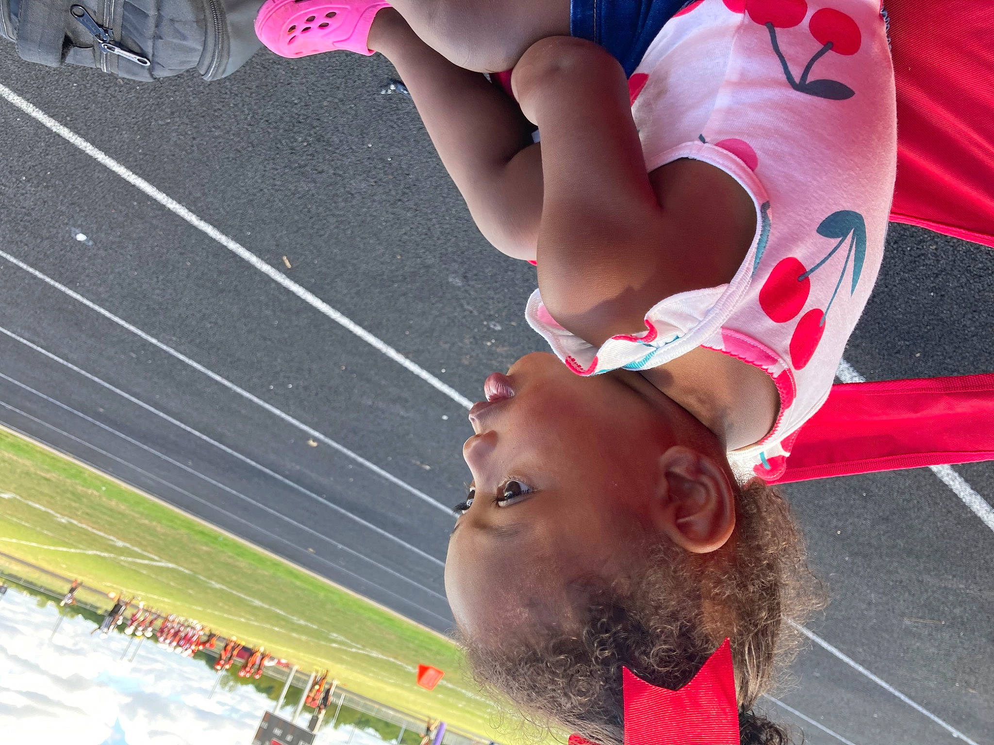 Laylah is registered to the contest to win money with this photo: championship, chest, competition_event, elbow, fan, fun, grass, happy, human_leg, leisure, person, player, recreation, shorts, sports, sportswear, team_sport, thigh, tournament, track_and_field_athletics