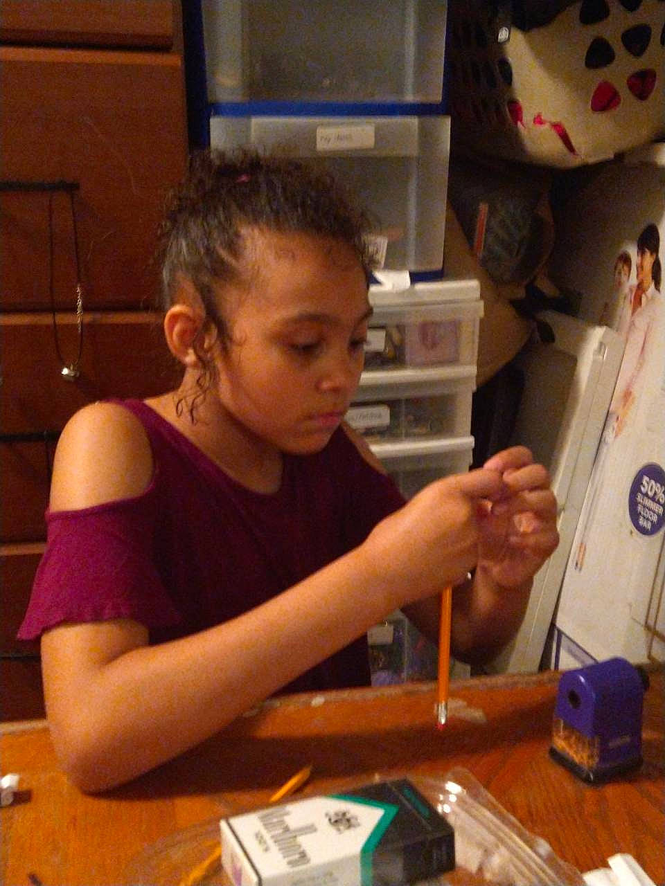 Kamilyah is registered to the contest to win money with this photo: art, artist, chair, child, desk, engineering, fun, games, office_supplies, pen, person, play, recreation, room, science, t_shirt, table, toddler, toy, visual_arts