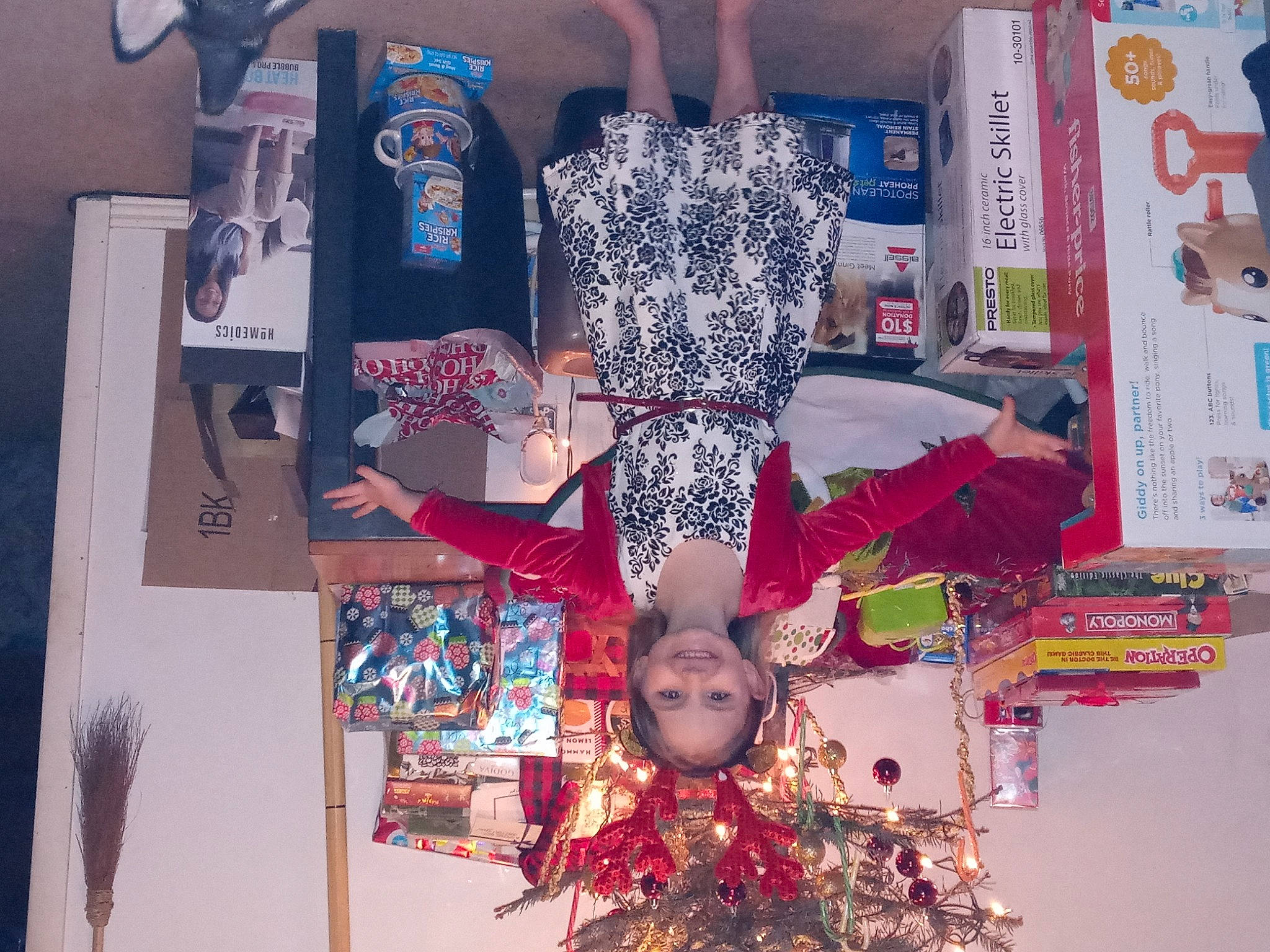 Ginny is registered to the contest to win money with this photo: christmas_decoration, holiday, interior_design, joy, ornament, person, tradition