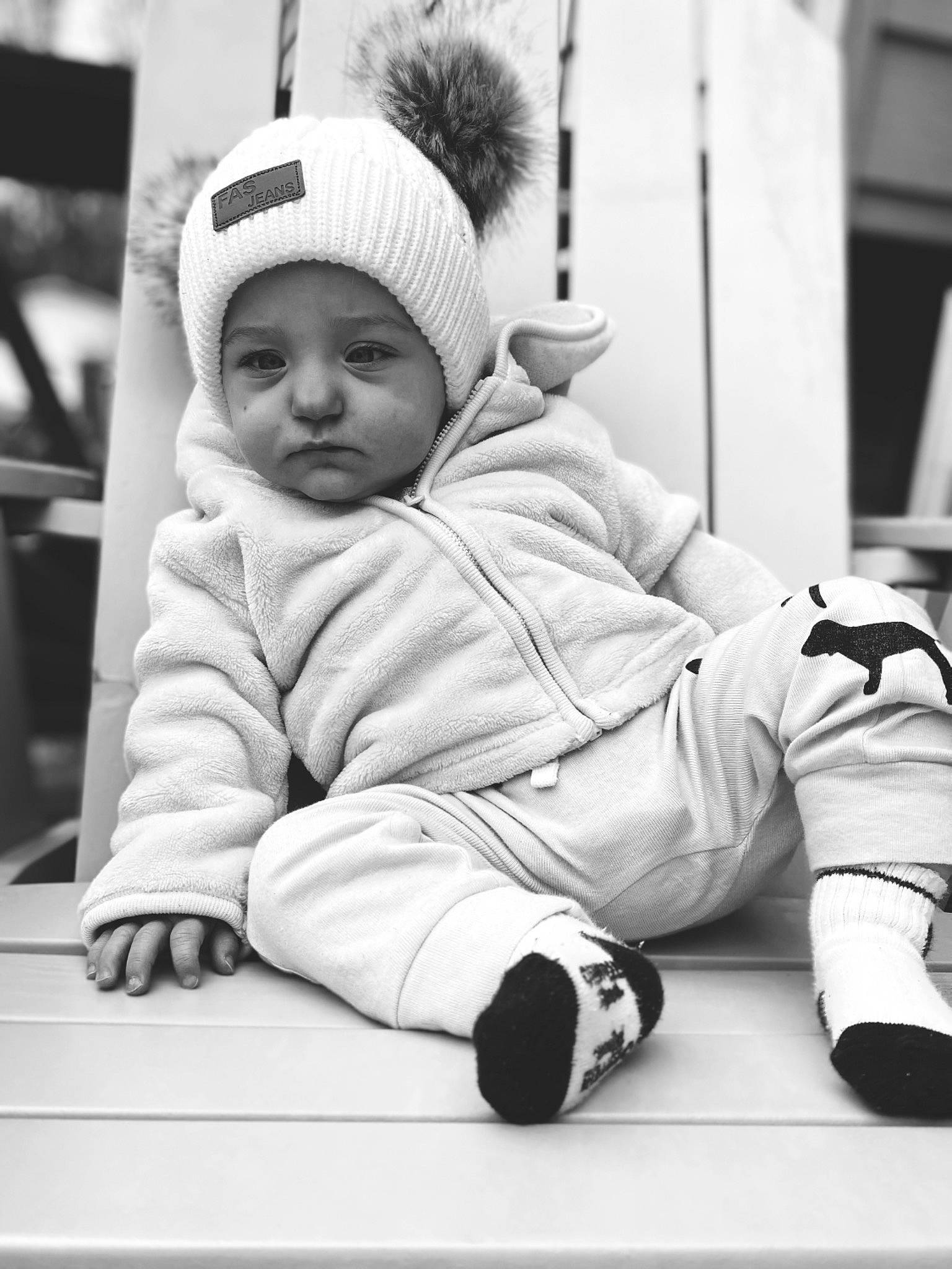 Serena joined the competition — help win amazing prizes! baby, black, black_and_white, cap, cheek, child, comfort, fun, happy, headgear, headwear, human, monochrome, monochrome_photography, person, room, sitting, stock_photography, street, style