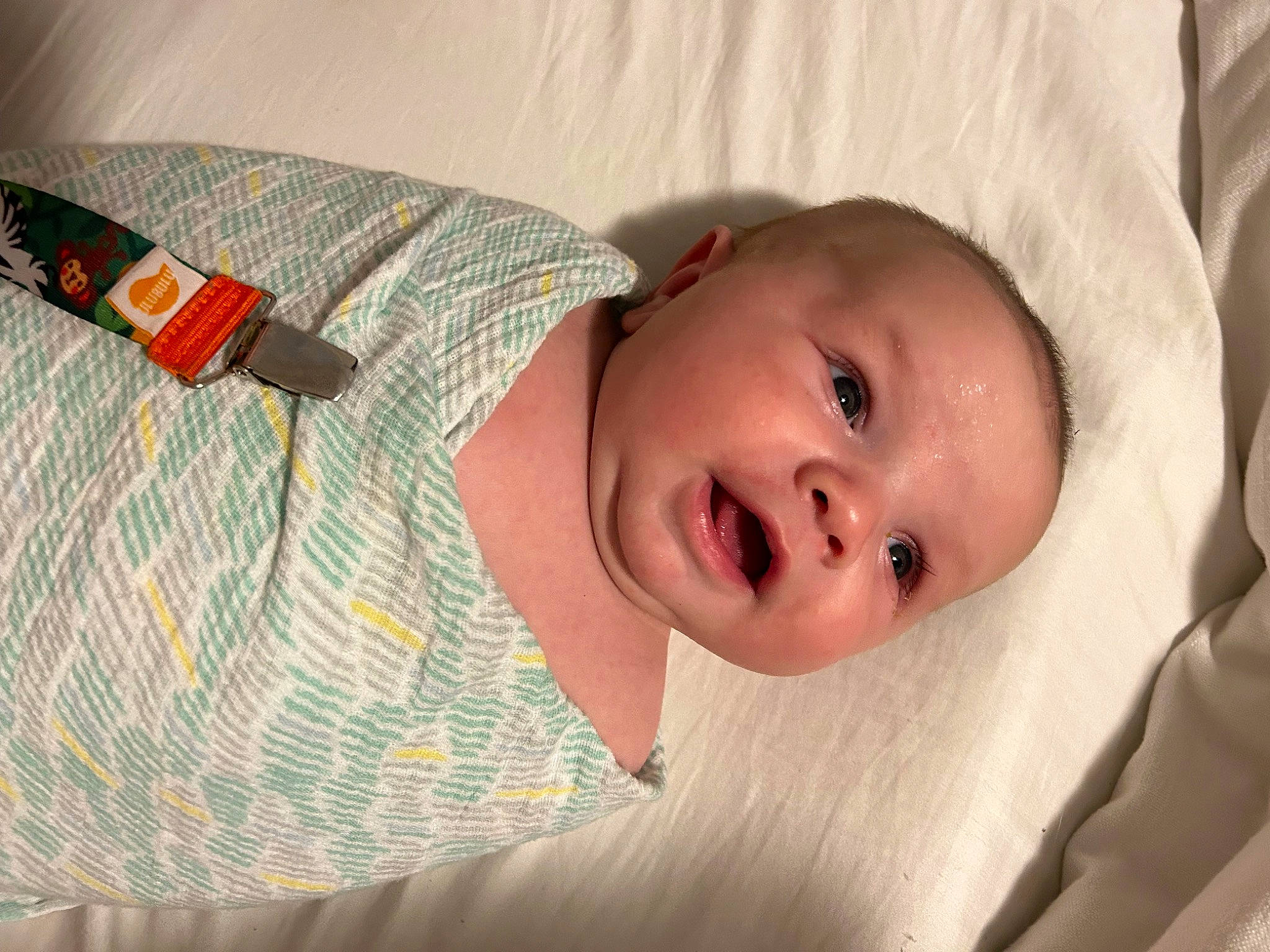 Kaidon is registered to the contest to win money with this photo: baby, baby_products, baby_toddler_clothing, cheek, child, clothing, comfort, eye, face, iris, linens, lip, nose, pattern, person, skin, sleeve, smile, textile, toddler