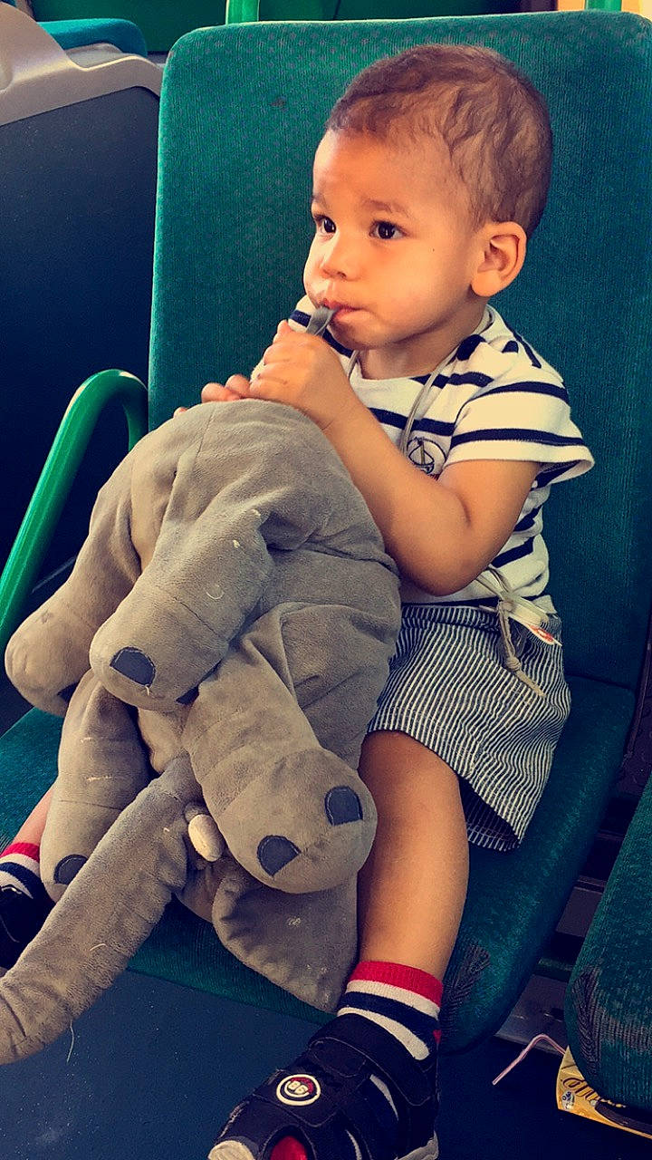 Marley-djibril a rejoint le concours — aidez-le/la à gagner de superbes lots ! arm, baby, cheek, child, eye, face, head, leg, nose, person, sitting, skin, smile, toddler