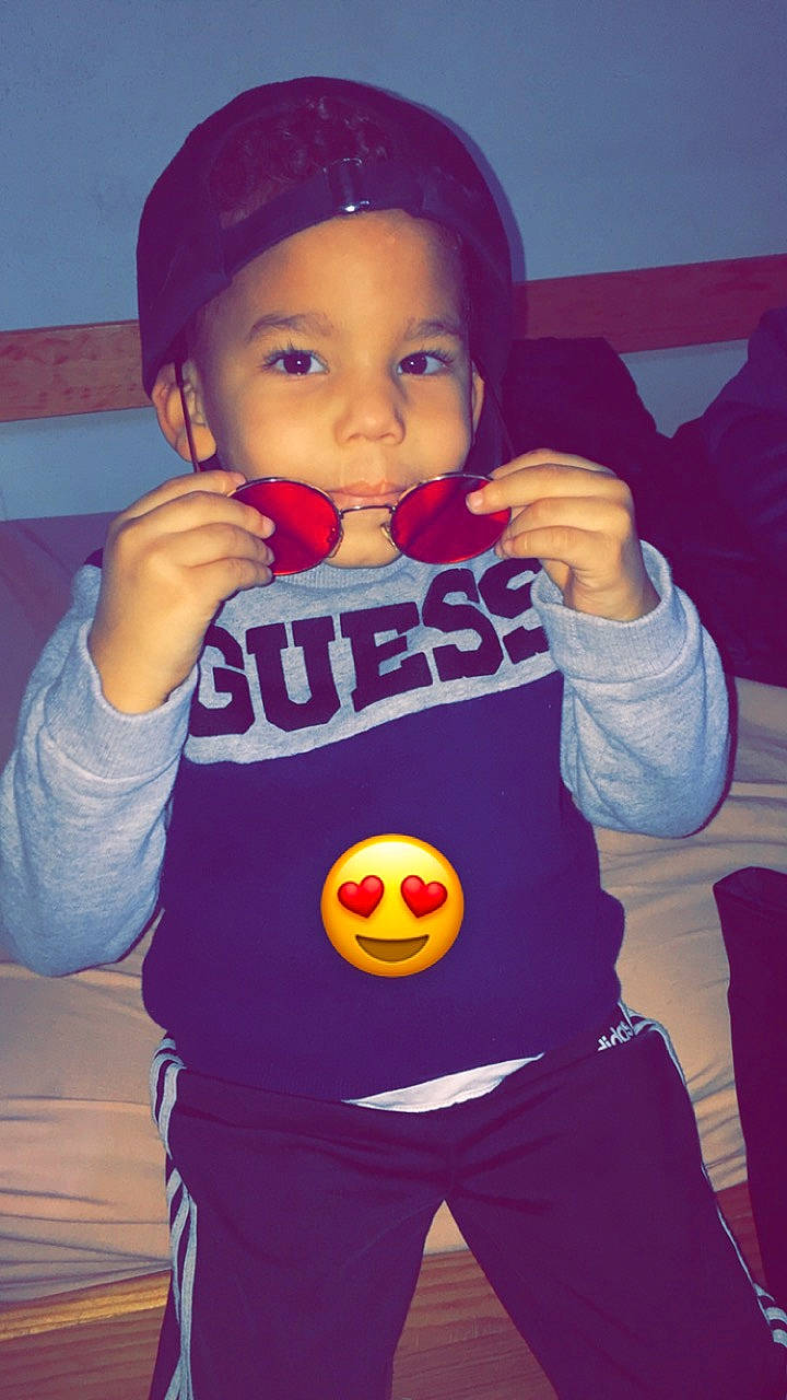 Marley-djibril a rejoint le concours — aidez-le/la à gagner de superbes lots ! angry_birds, arm, baby_toddler_clothing, beanie, cap, cheek, child, electric_blue, finger, fun, gesture, happy, headwear, junk_food, organ, person, play, red, sleeve, t_shirt