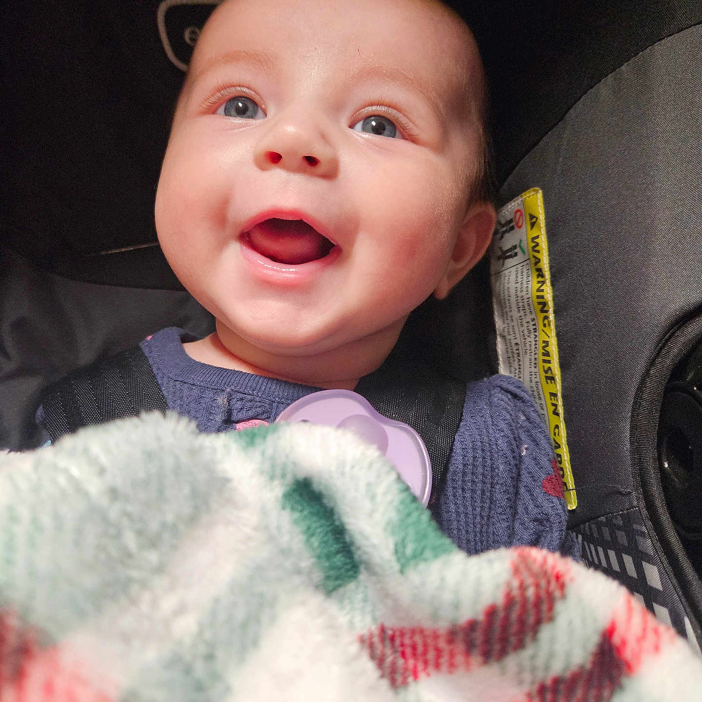 Grace joined the competition — help win amazing prizes! baby, blanket, bodypart, car, car_interior, carseat, face, happy, head, homedecor, laughing, mouth, newborn, person, photography, portrait, smile, towel, transportation, vehicle