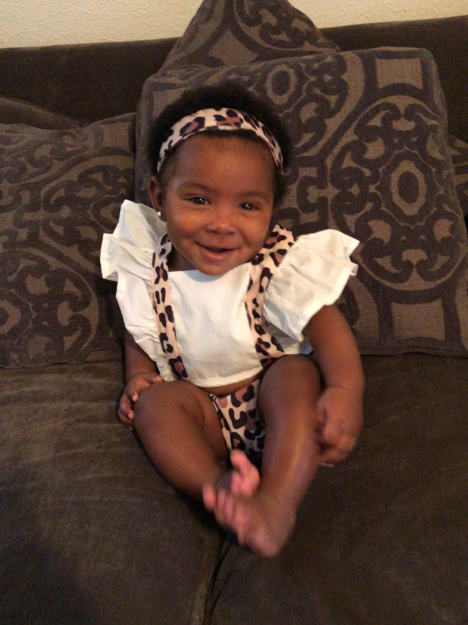 Amayah joined the competition — help win amazing prizes! arm, baby, baby_toddler_clothing, child, head, headgear, joy, person, sitting, smile, toddler