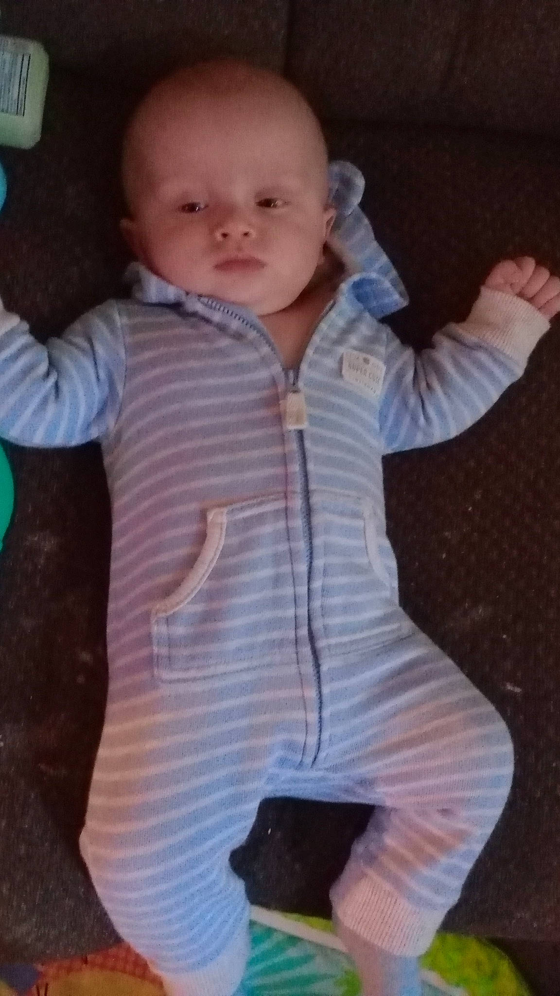 Remington joined the competition — help win amazing prizes! baby, baby_toddler_clothing, cheek, child, collar, comfort, face, finger, gesture, head, neck, nose, outerwear, pattern, person, shoulder, sleeve, standing, thumb, toddler