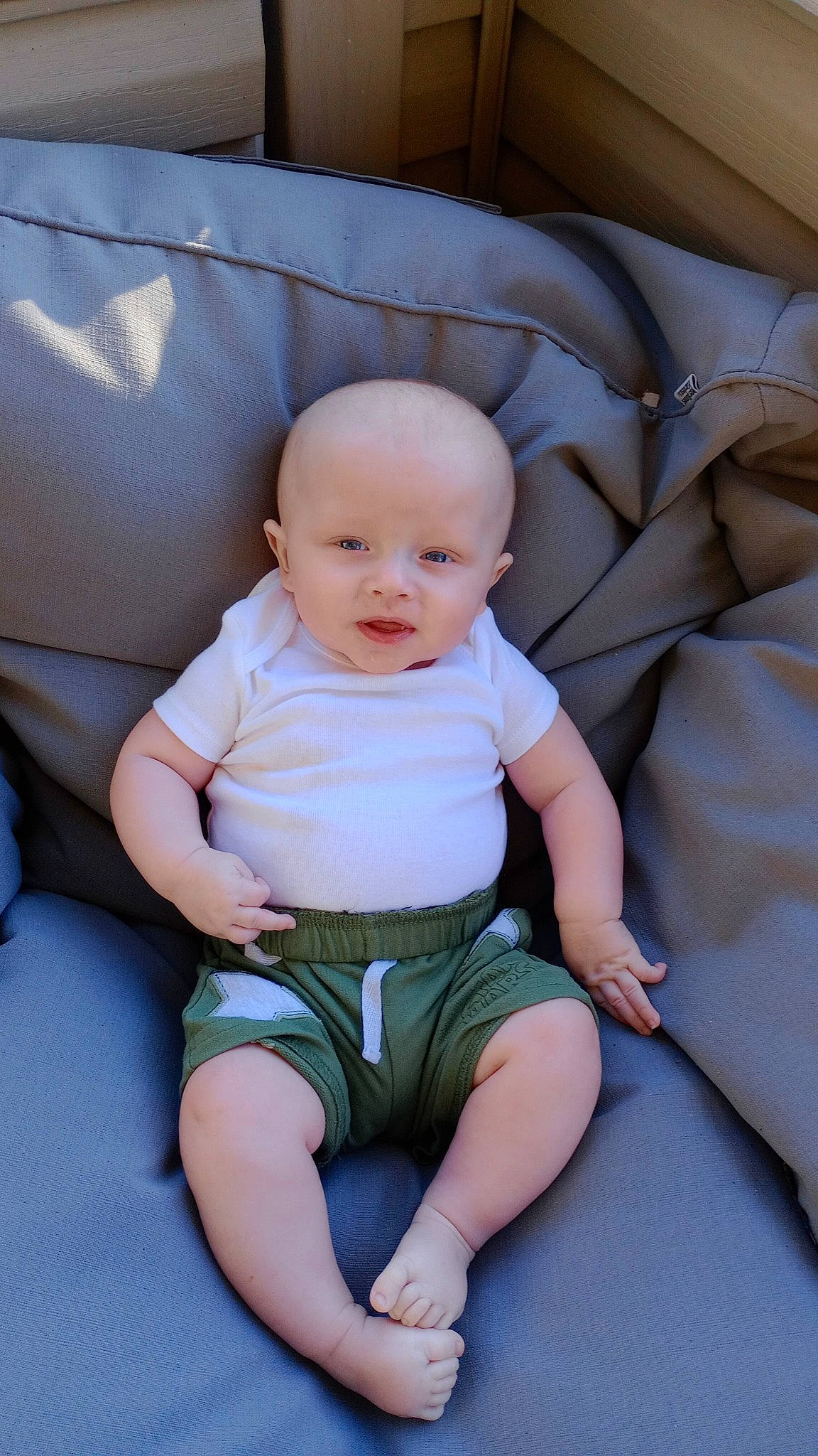 Remington joined the competition — help win amazing prizes! abdomen, baby, baby_toddler_clothing, cheek, child, comfort, eye, face, foot, human_leg, knee, leg, person, shorts, sitting, skin, sleeve, sock, t_shirt, thigh