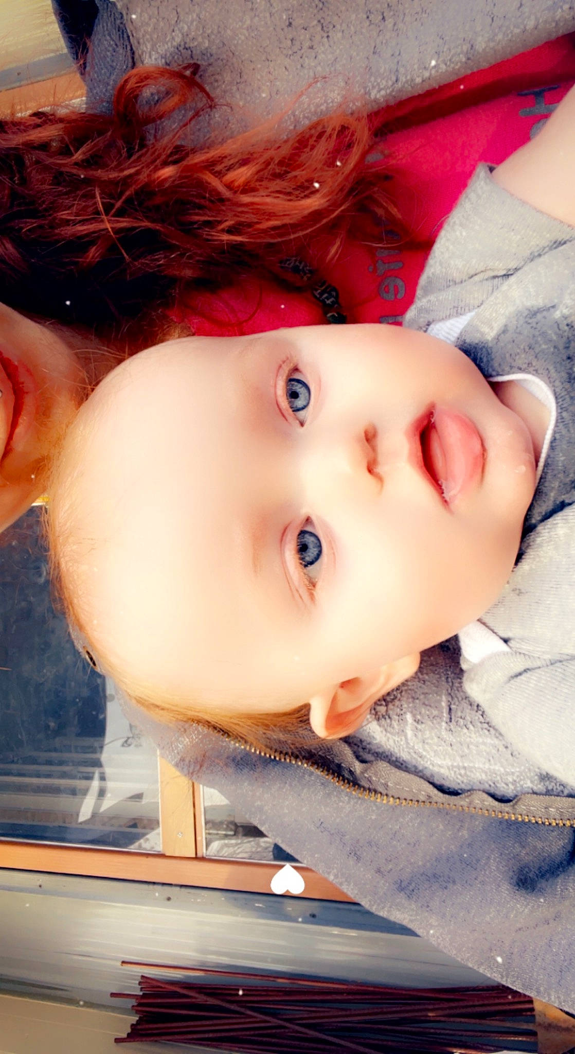 Graysen is registered to the contest to win money with this photo: baby, cheek, child, chin, close_up, cool, eyebrow, eyelash, forehead, happy, iris, jaw, lip, mouth, neck, nose, person, red_hair, skin, sleeve