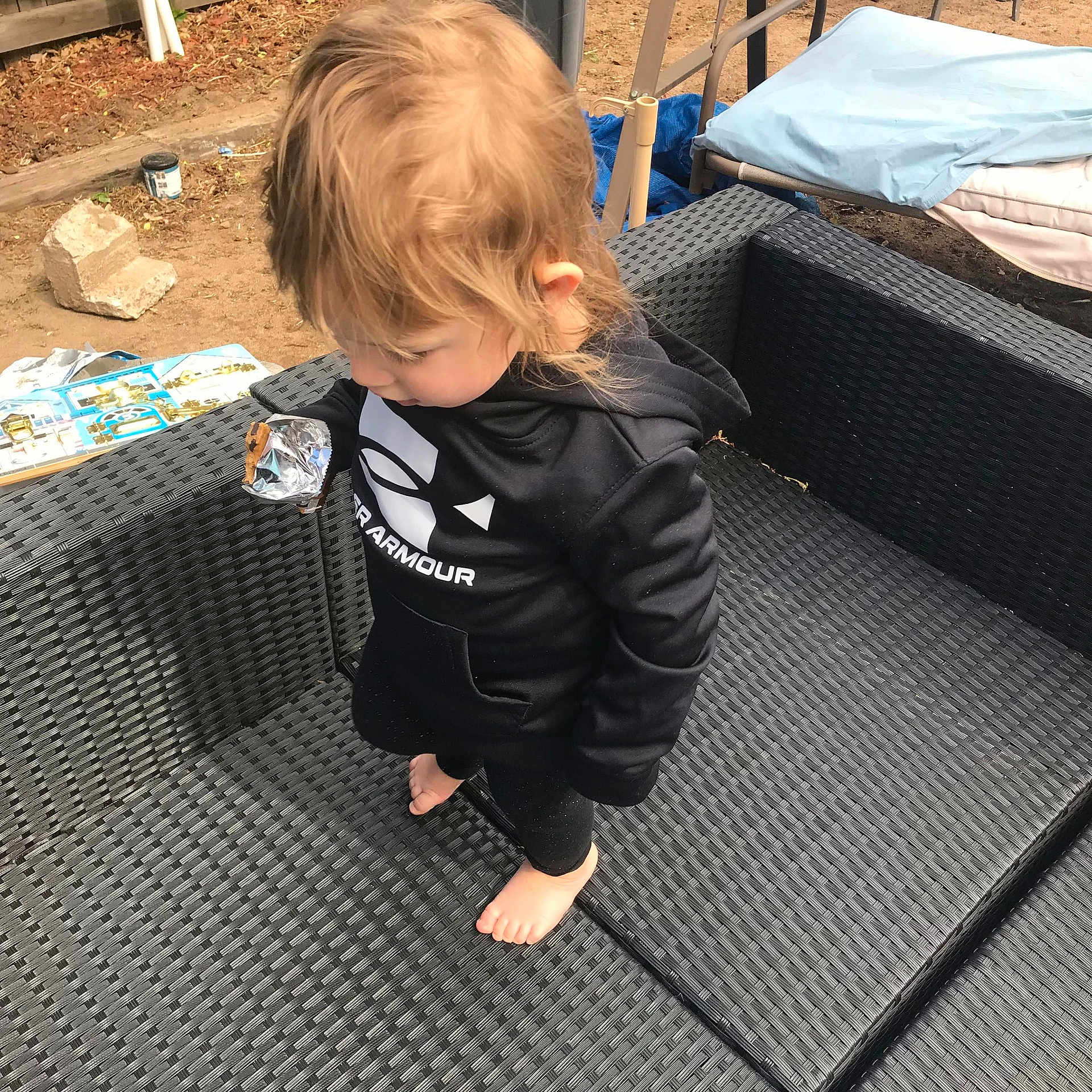 Lavena is registered to the contest to win money with this photo: baby_products, baby_toddler_clothing, bag, child, comfort, flooring, fun, grass, hoodie, jacket, luggage_and_bags, outdoor_furniture, pattern, room, sitting, sleeve, sneakers, t_shirt, toddler, wood