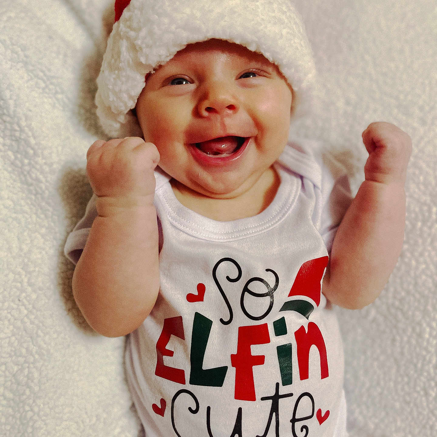 Makinsley joined the competition — help win amazing prizes! baby, babylaughing, beanie, bodypart, bonnet, cap, clothing, face, finger, hand, happy, hat, head, laughing, newborn, person, photography, portrait, smile, t_shirt
