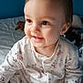 Jaxx is registered to the contest to win money with this photo: baby, babylaughing, bed, bedroom, bodypart, clothing, crawling, dress, face, finger, furniture, hand, happy, head, indoors, person, photography, portrait, room, smile