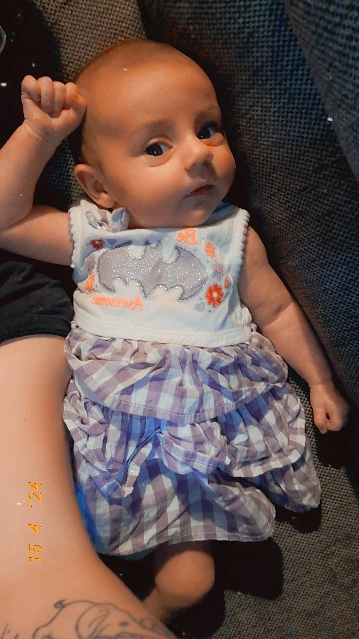 Jazmynn is registered to the contest to win money with this photo: baby, baby_toddler_clothing, cheek, day_dress, dress, finger, flash_photography, iris, joint, lip, mouth, neck, nose, person, shoulder, skin, sleeve, textile, thigh, toddler