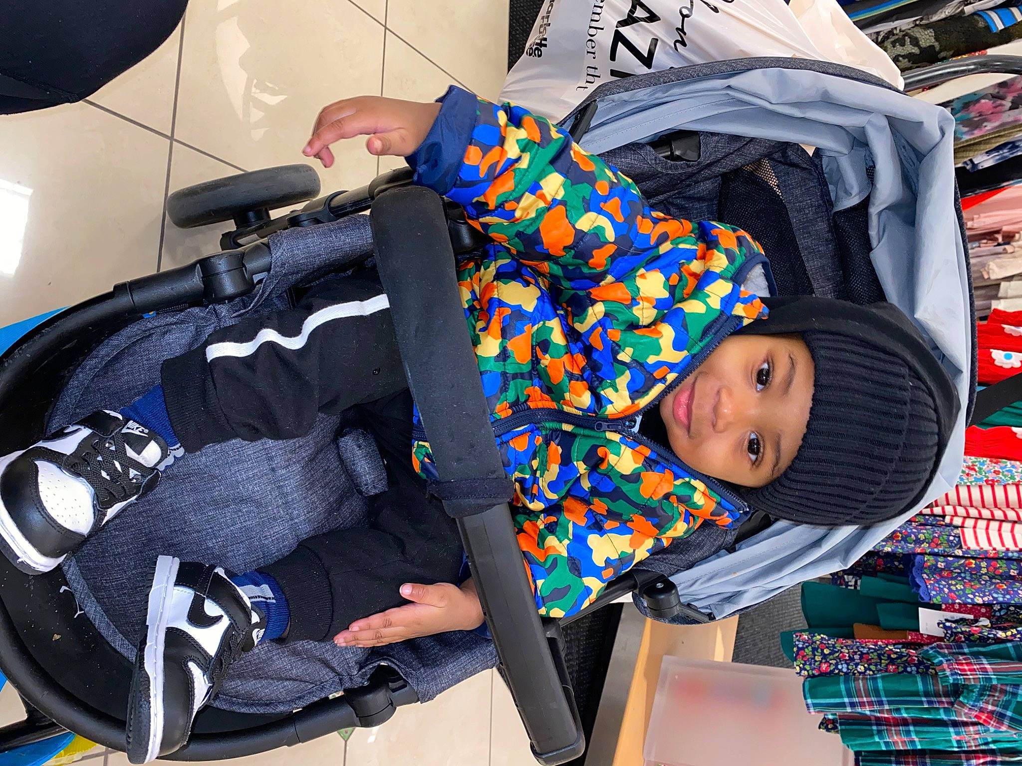 Damir is registered to the contest to win money with this photo: automotive_design, baby, baby_products, baby_toddler_clothing, bag, baggage, blue, child, comfort, electric_blue, family_car, fun, headwear, joy, leisure, luggage_and_bags, person, product, room, shelf