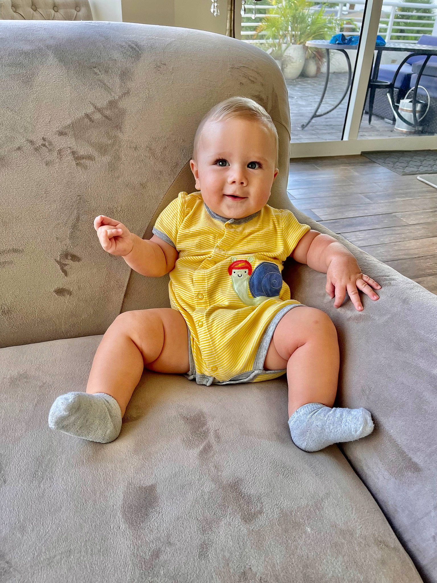 Leonardo joined the competition — help win amazing prizes! baby, baby_toddler_clothing, chair, child, comfort, floor, flooring, fun, grass, happy, joy, knee, leisure, person, plant, sitting, skin, sleeve, smile, t_shirt
