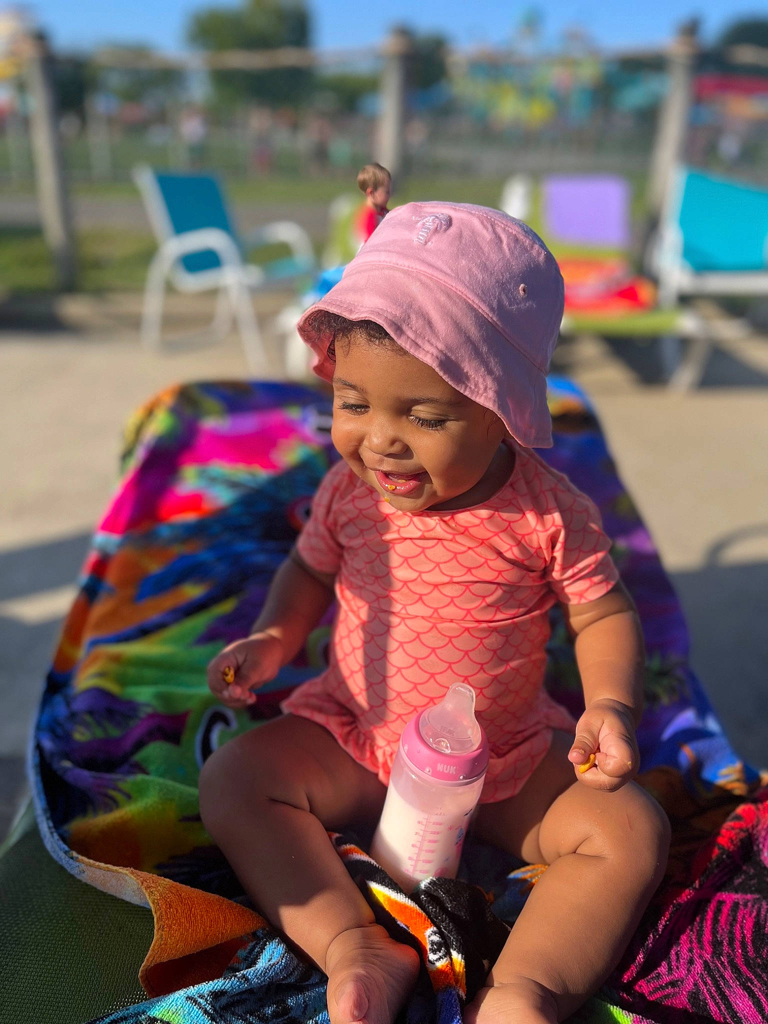 Jaelynn joined the competition — help win amazing prizes! cap, child, event, facial_expression, fun, grass, happy, hat, headwear, lap, leisure, magenta, morning, person, pink, recreation, skin, sky, summer, sun_hat
